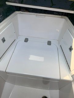 The image shows the bow area of a 2001 Intrepid 322 Cuddy.