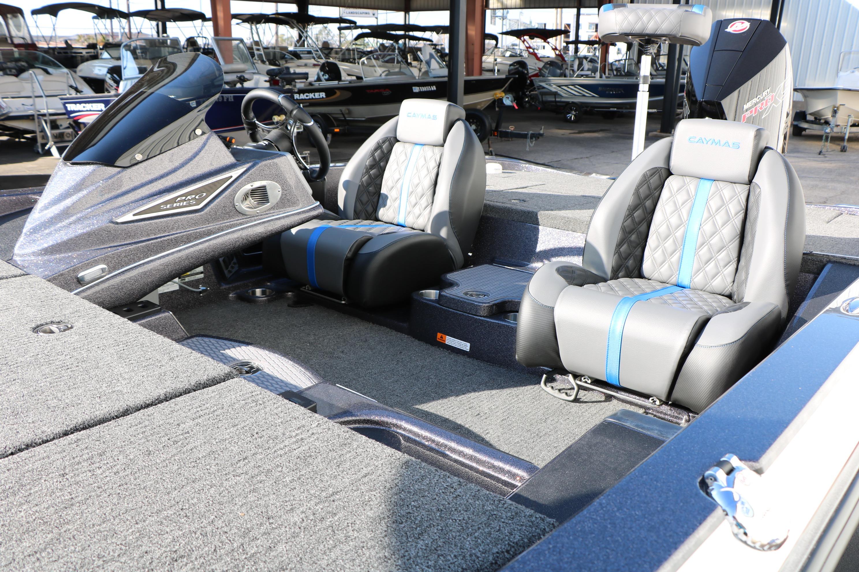 2027 Caymas 201 Pro boat interior with dual seats and modern dashboard design.