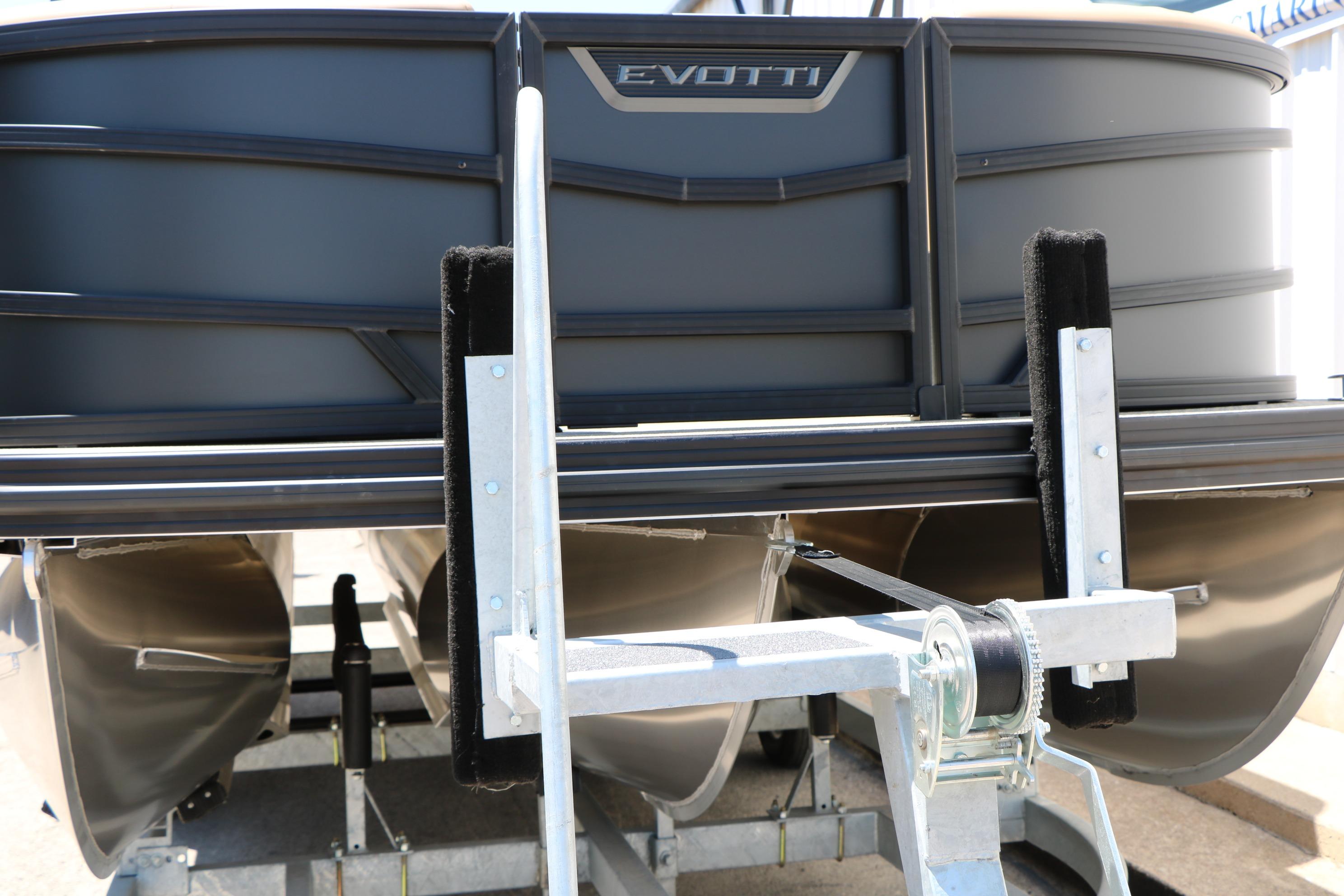 2026 Evotti 521CS pontoon boat on trailer, close-up view.