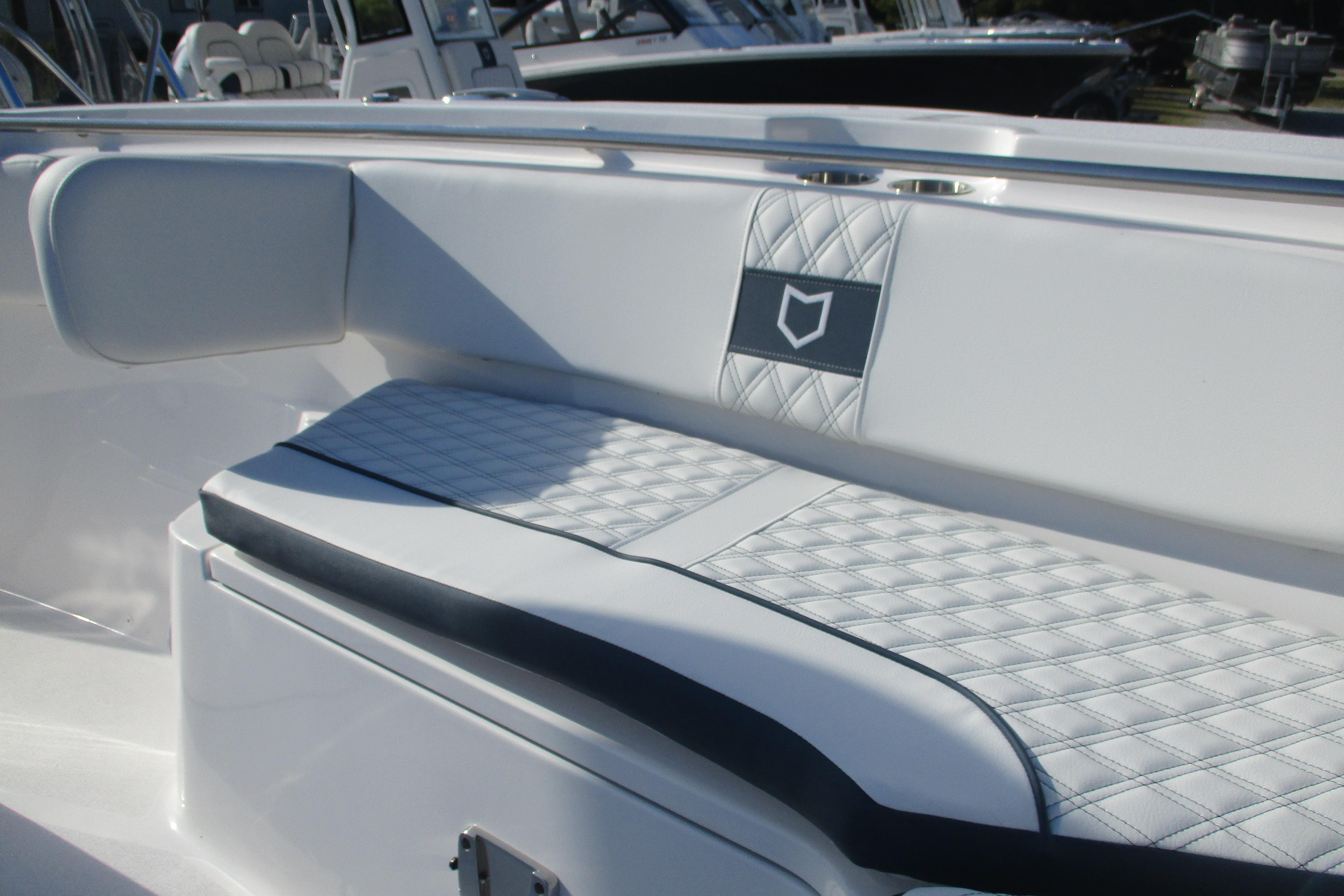 2026 Sea Fox 328 Commander boat interior with quilted seating and sleek design.