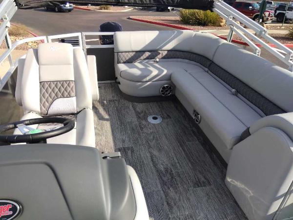 2024 Ranger Reata 223C boat interior with plush seating and modern design.