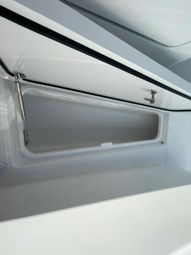 Storage compartment of the 2025 Mag Bay 43 Center Console boat.