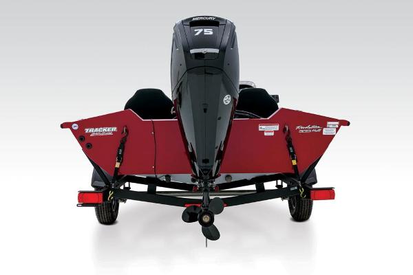 Red Tracker boat with Mercury engine, on a trailer, rear view.