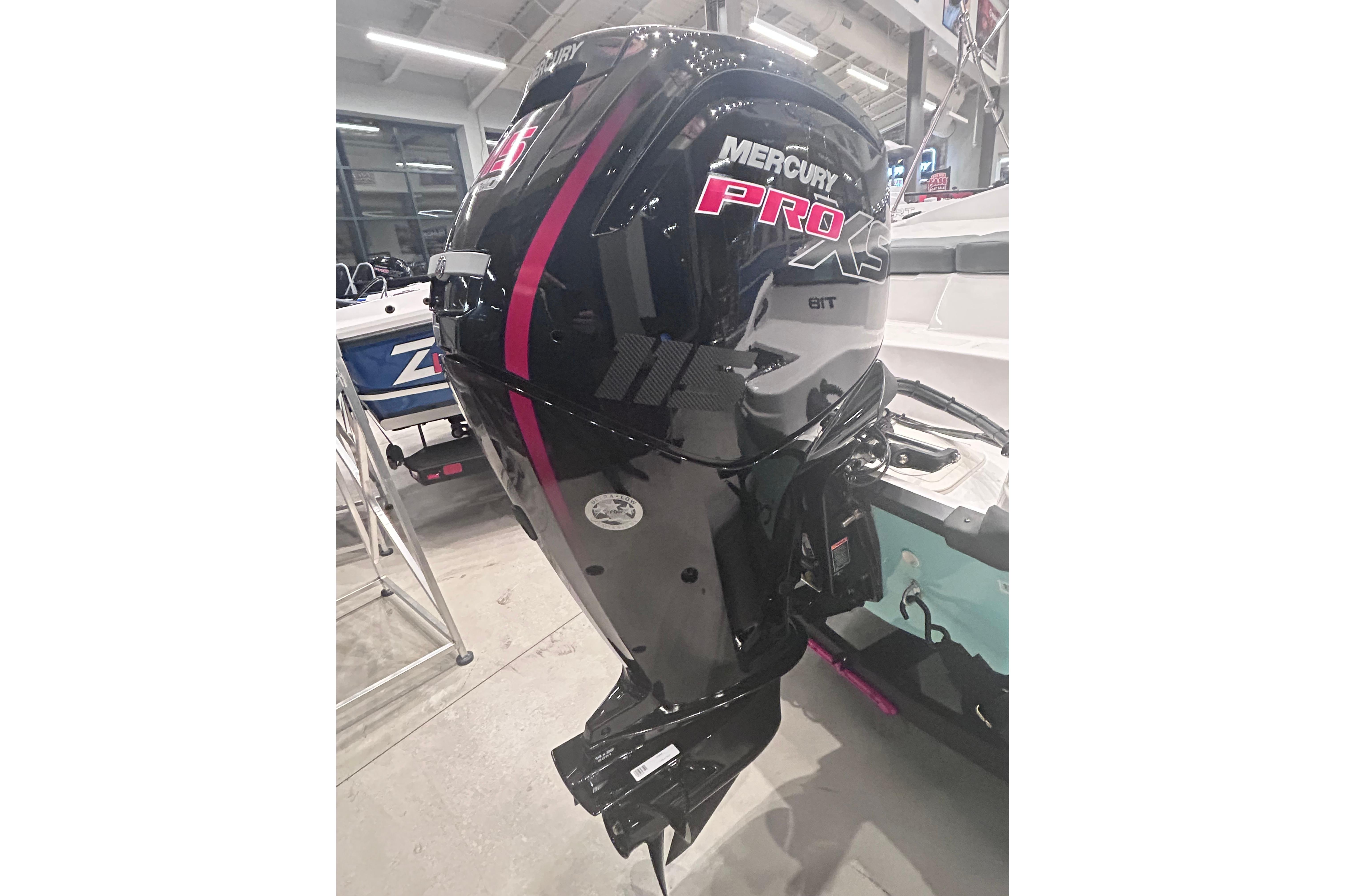 2026 Tahoe T18 with Mercury Pro XS outboard motor in showroom.
