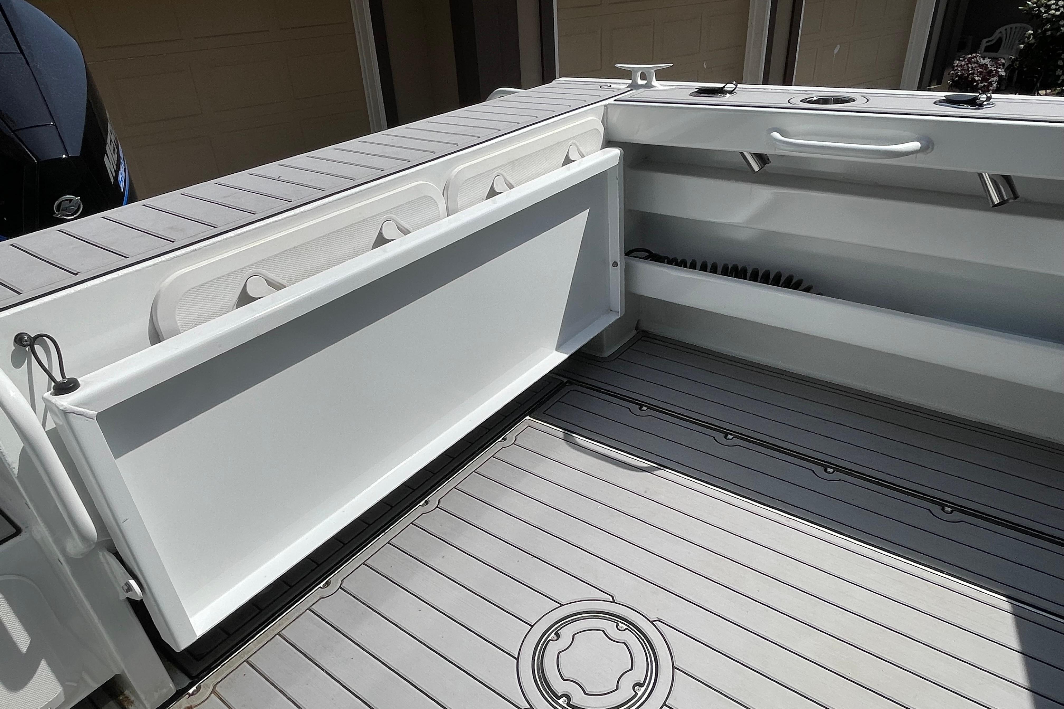 2025 Custom Aluminum 7.5 Profisher boat interior with open storage compartment and sleek design.