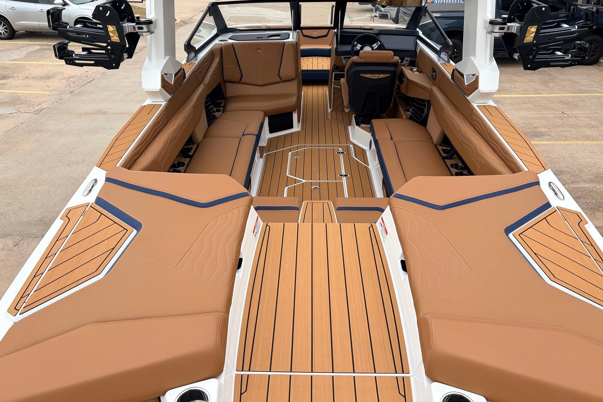 2026 Nautique Super Air Nautique G25 interior with tan upholstery and sleek design.
