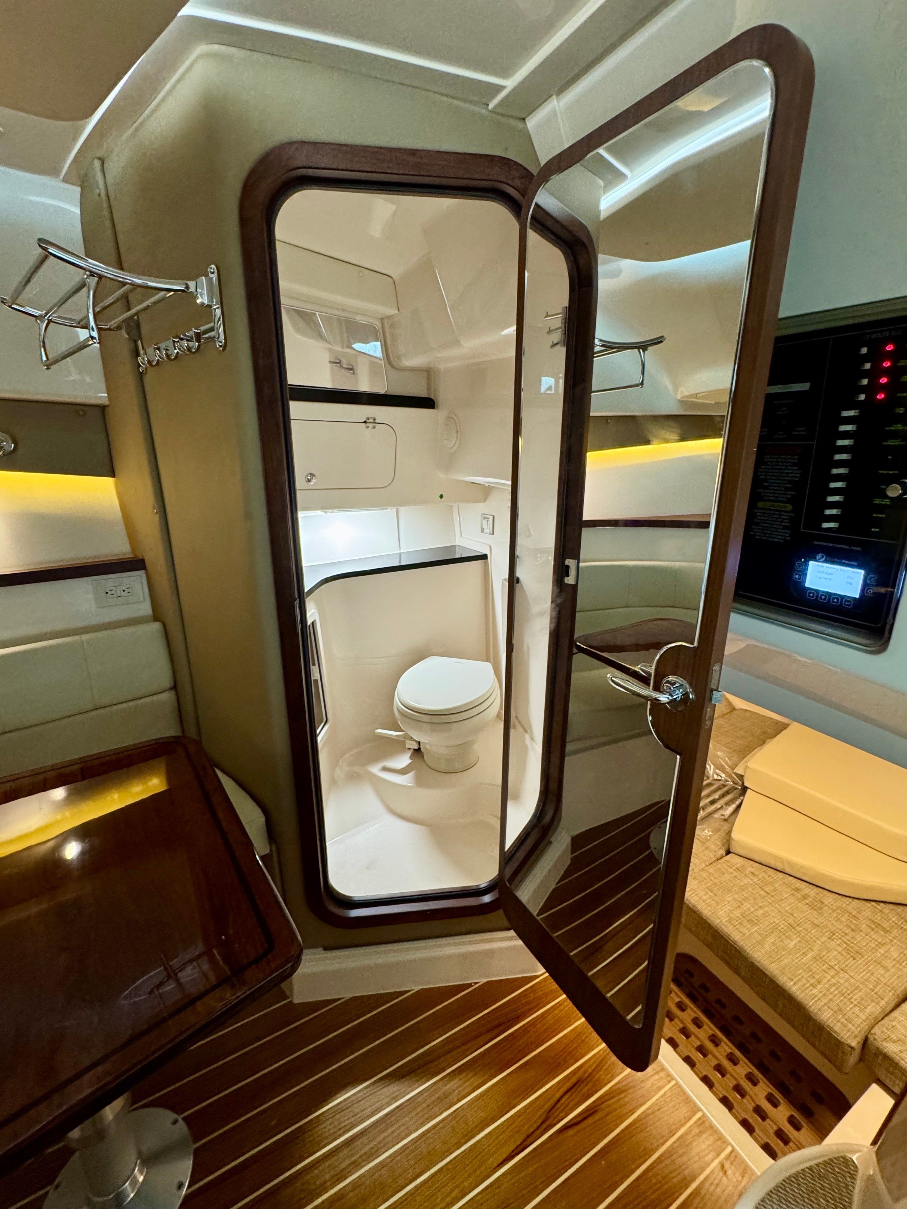 Interior of 2025 Grady-White Express 330 yacht featuring bathroom.