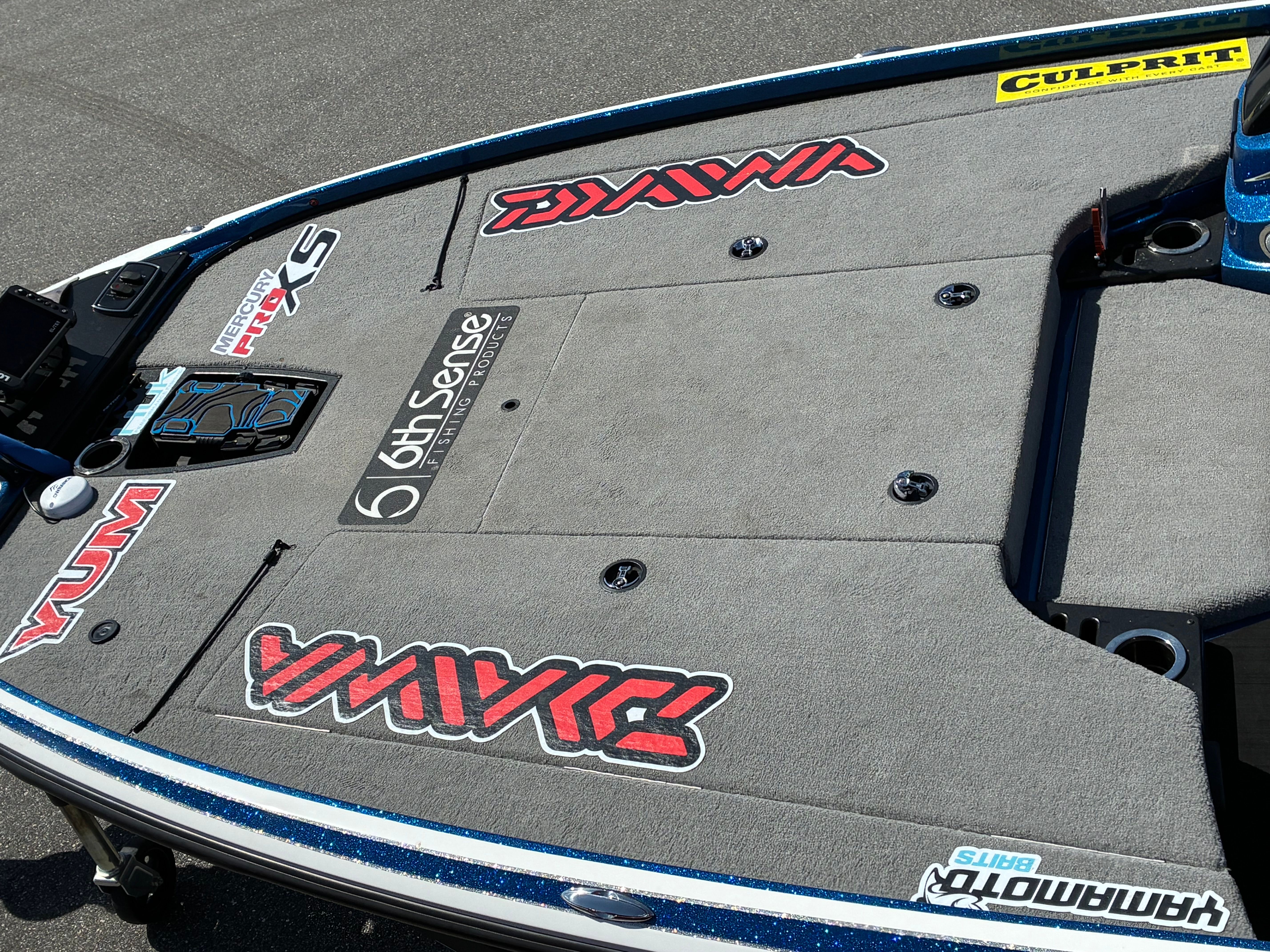 2024 Nitro Z18 Pro boat deck with brand logos and gray carpet.
