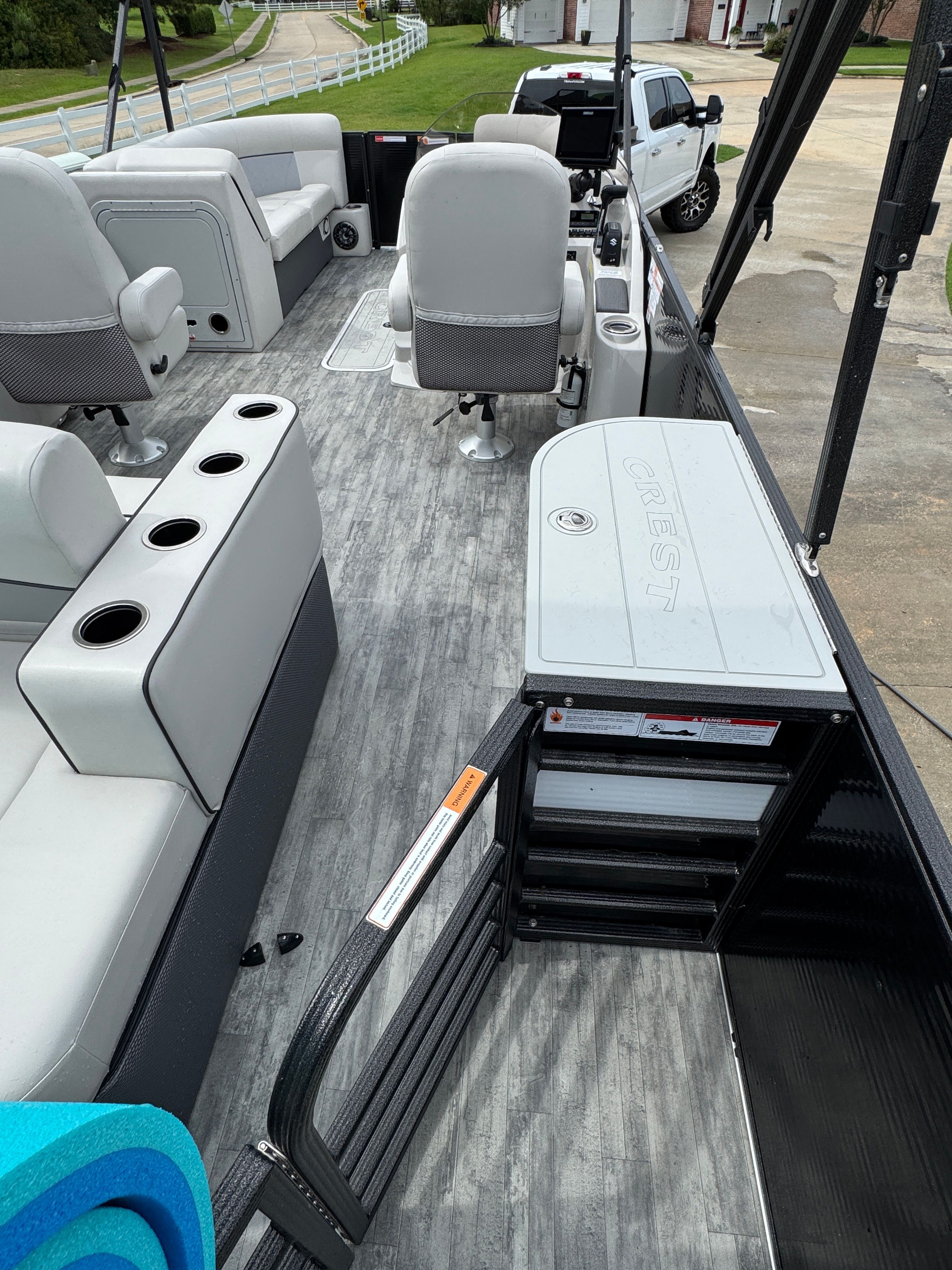 Interior of a 2022 Crest Classic DLX 220 pontoon boat.