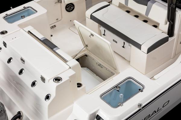 Manufacturer Provided Image: 2025 Robalo R300 Center Console boat interior with open storage compartments and seating.