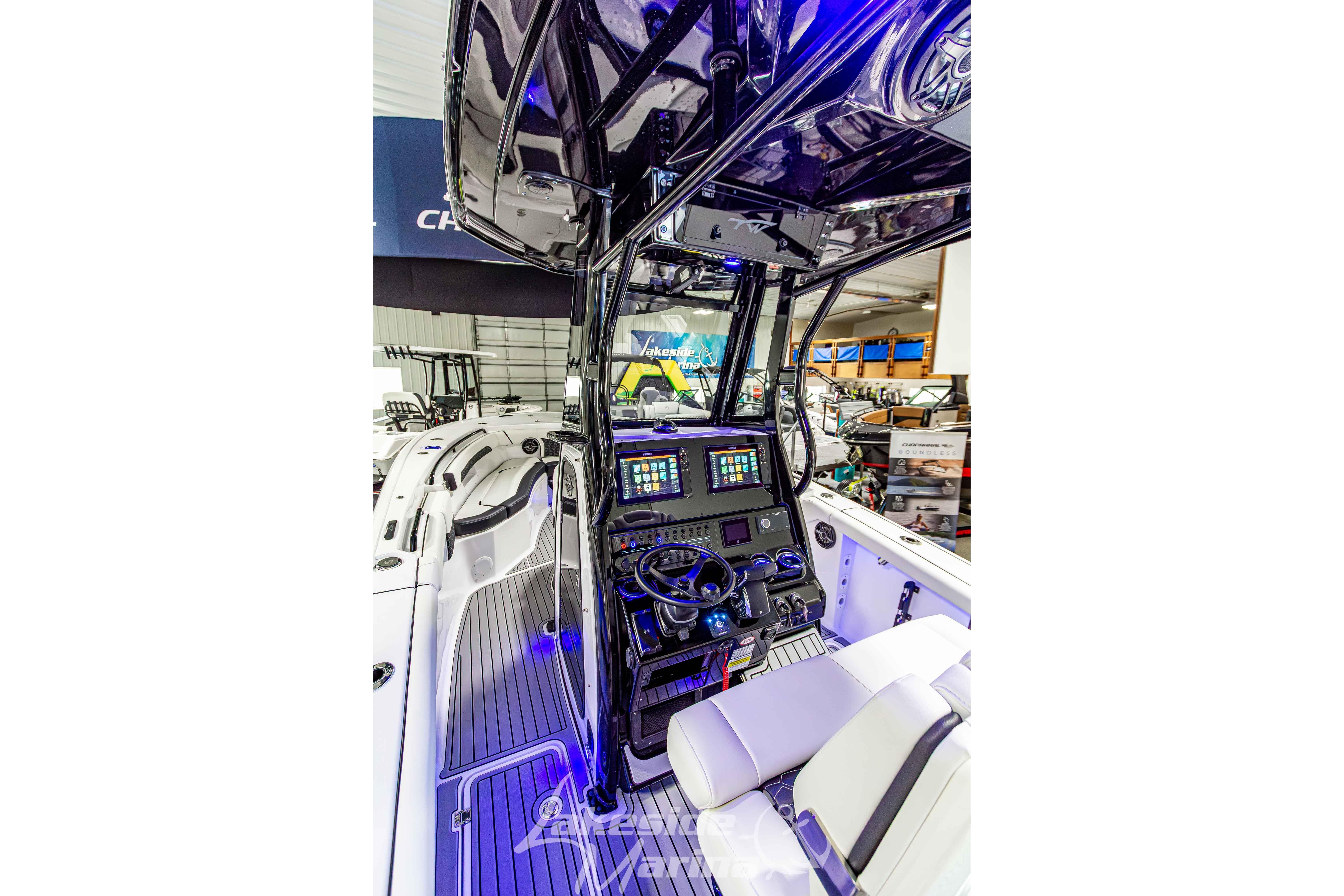 Interior view of 2026 Tidewater 256 LXF boat with advanced navigation system and sleek design.