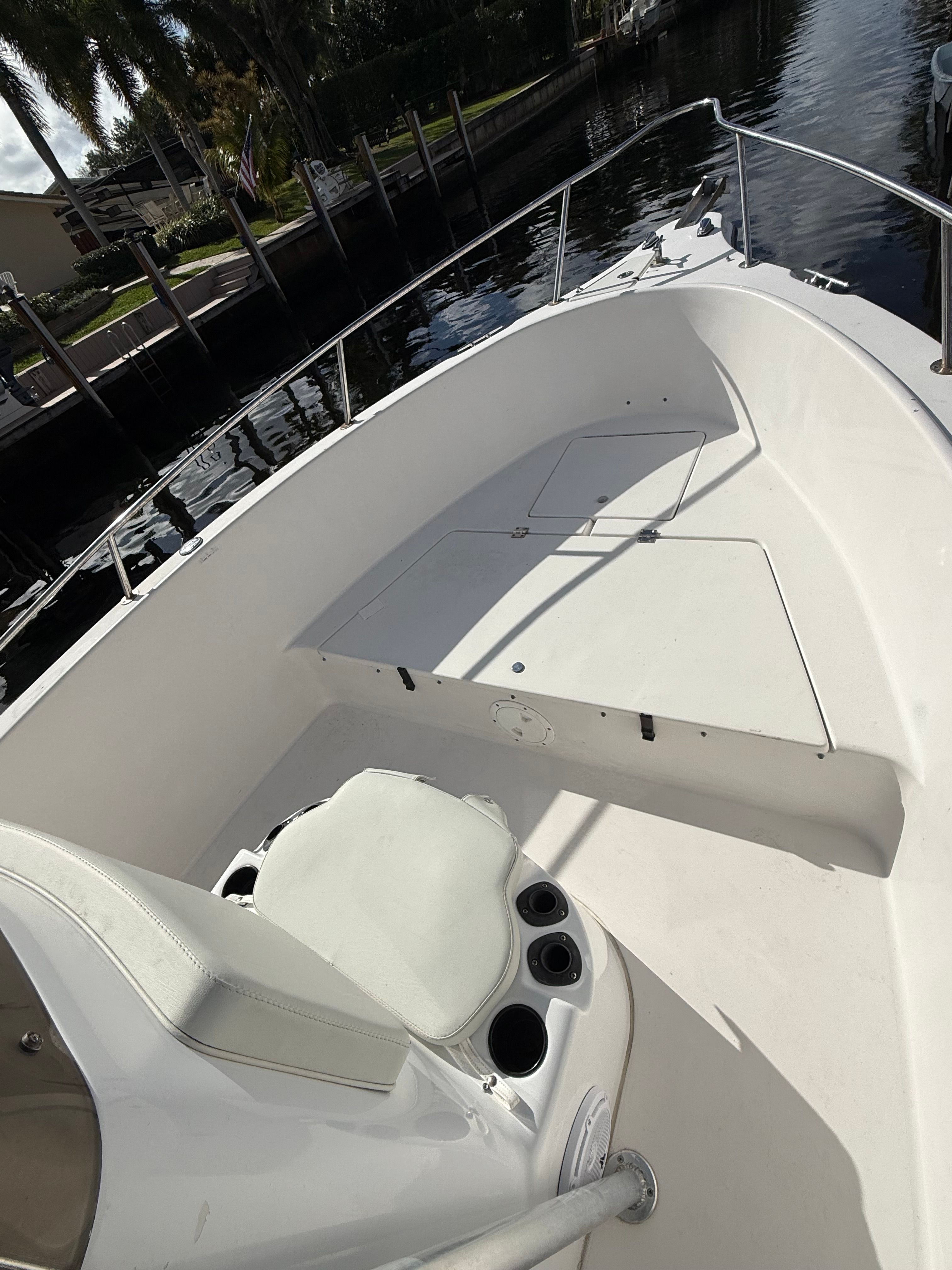 2006 Seaswirl Striper Center Console boat by the canal.