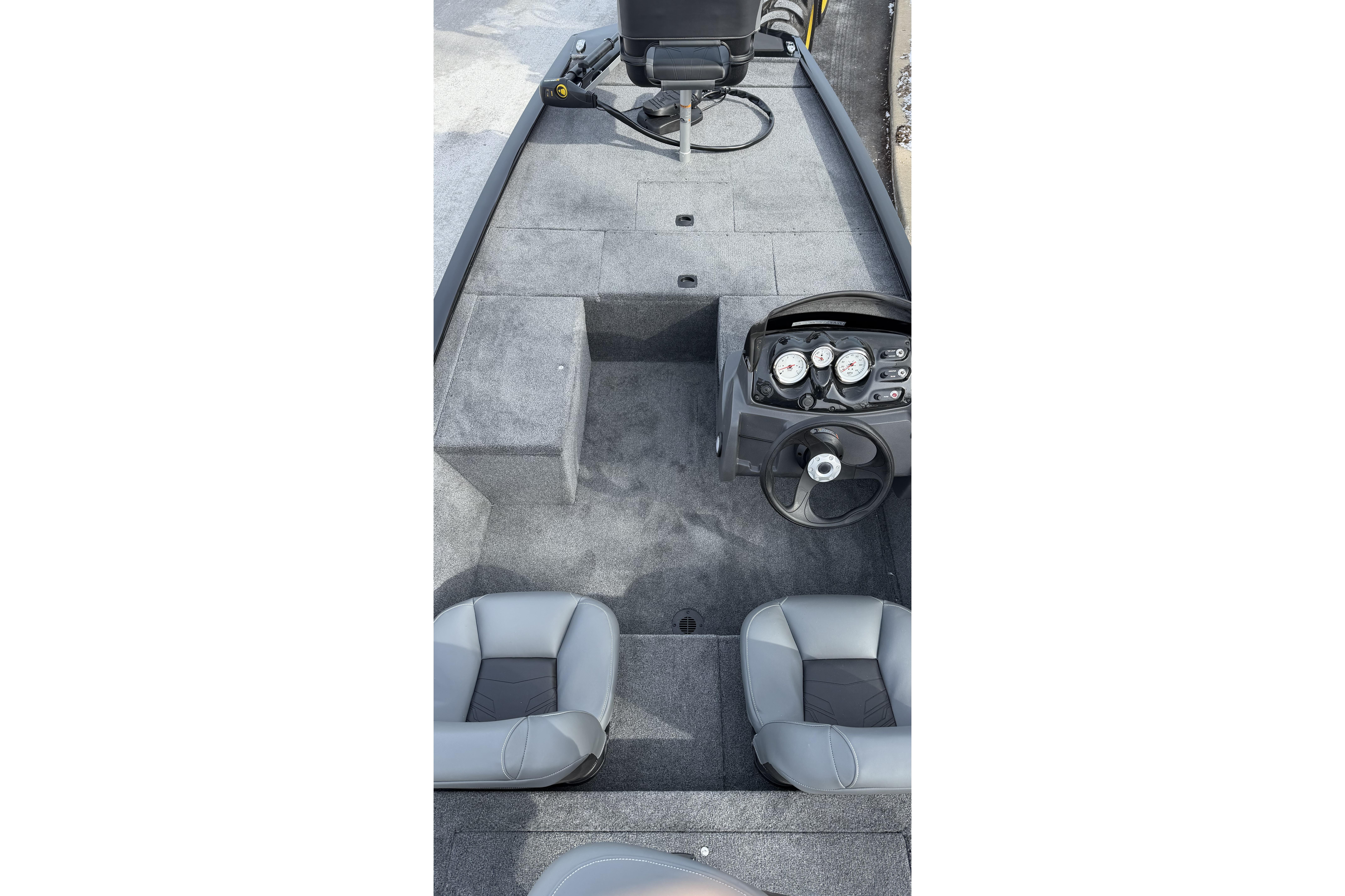 2026 Tracker Pro 170 boat interior with steering console and seating.