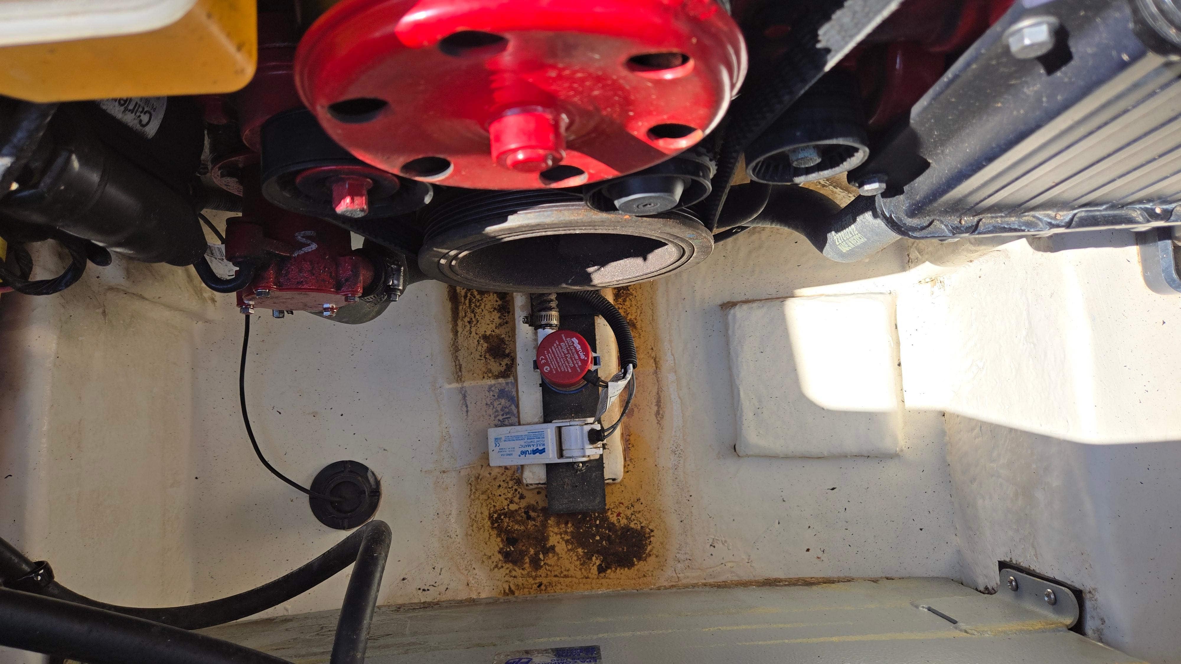 Engine compartment of 2018 Chaparral 224 Sunesta boat, showing mechanical components and wiring.