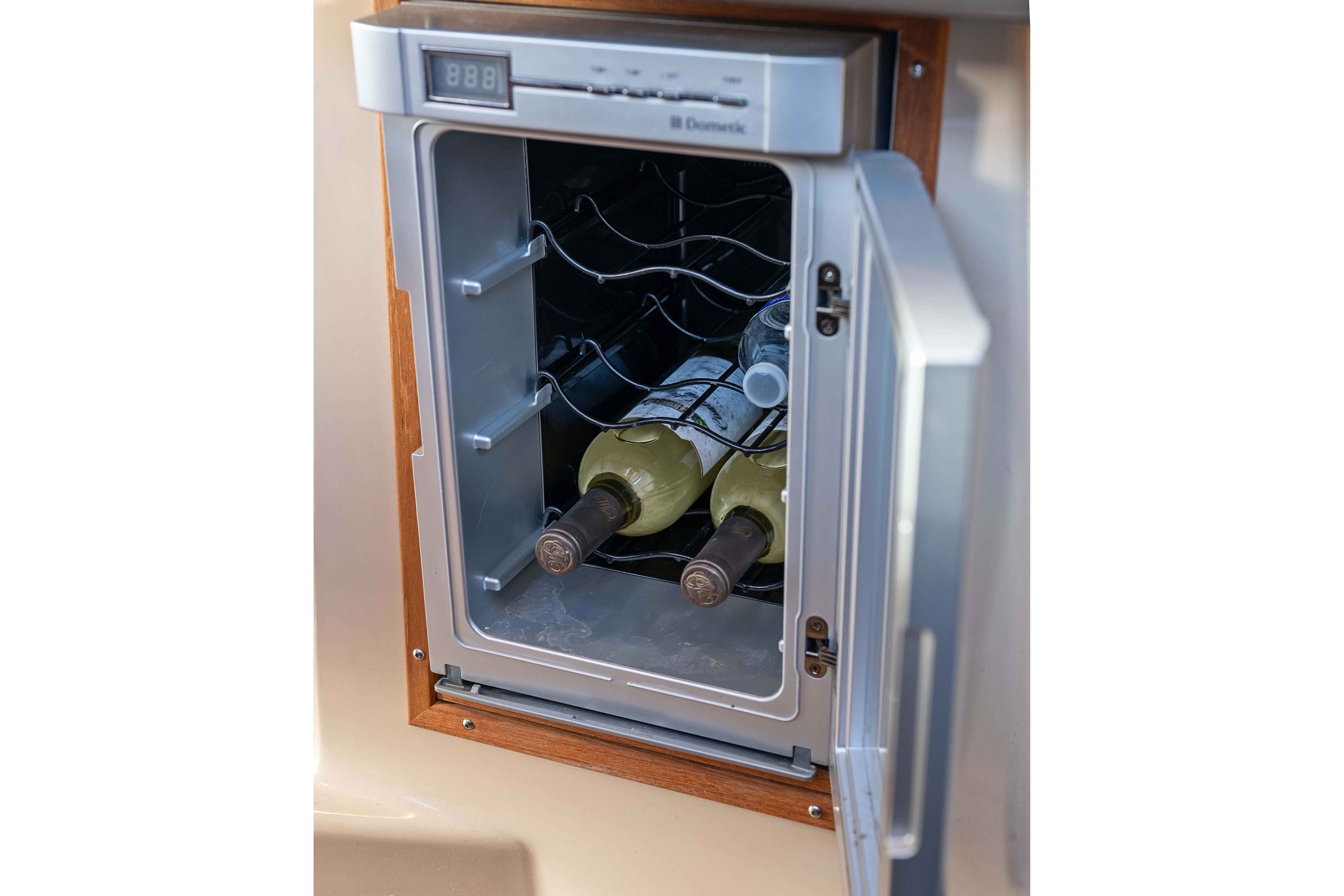 Wine cooler on 2014 Ranger Tug R-31 CB with bottles inside.