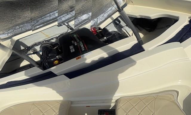 2014 Chris-Craft Launch 25 boat engine compartment with open cover.