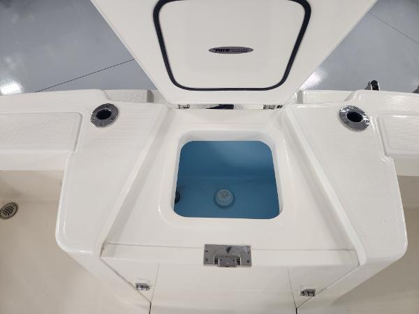 2025 Pathfinder 2400 Open boat livewell with open lid, showcasing interior design.