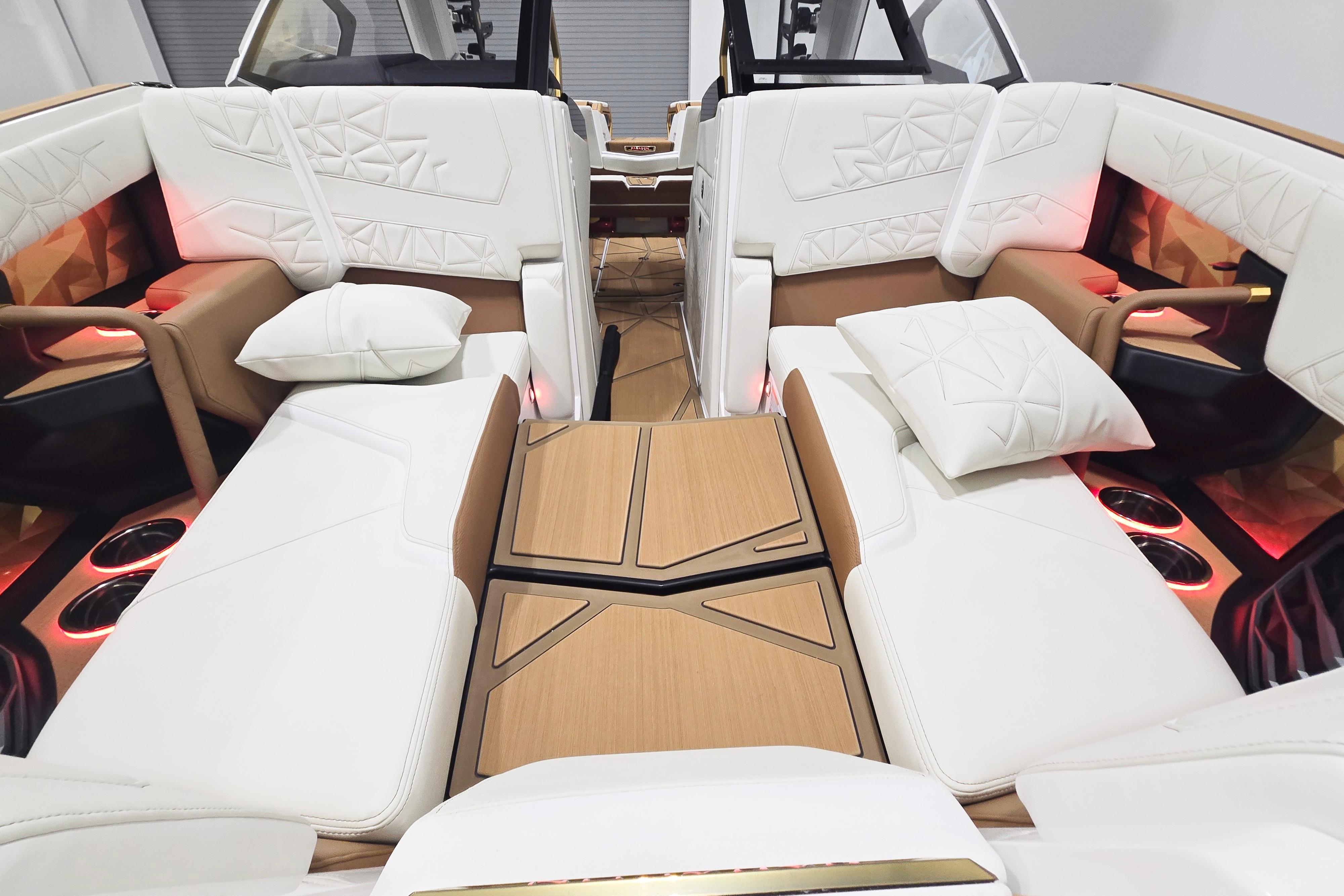 Luxurious interior of 2026 Nautique Super Air Nautique G23 Paragon with plush seating and ambient lighting.