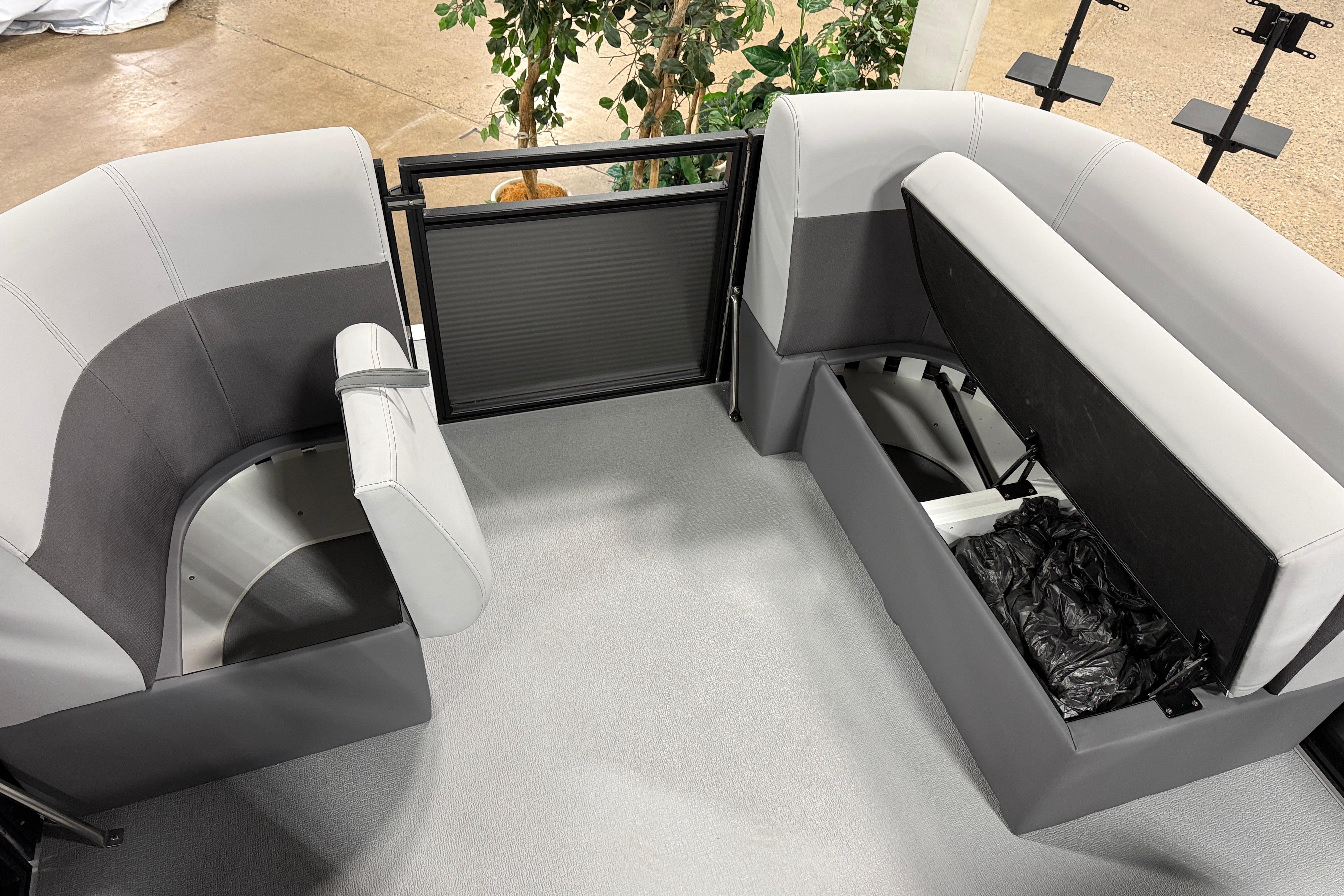 2026 Angler Quest 7515 Leisure Quest Cruise boat interior with seating and storage.