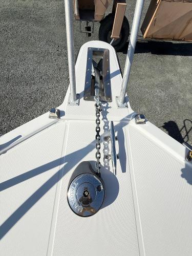 Bow of 2001 Albemarle 280 Express Sport Fisherman with anchor chain and winch.