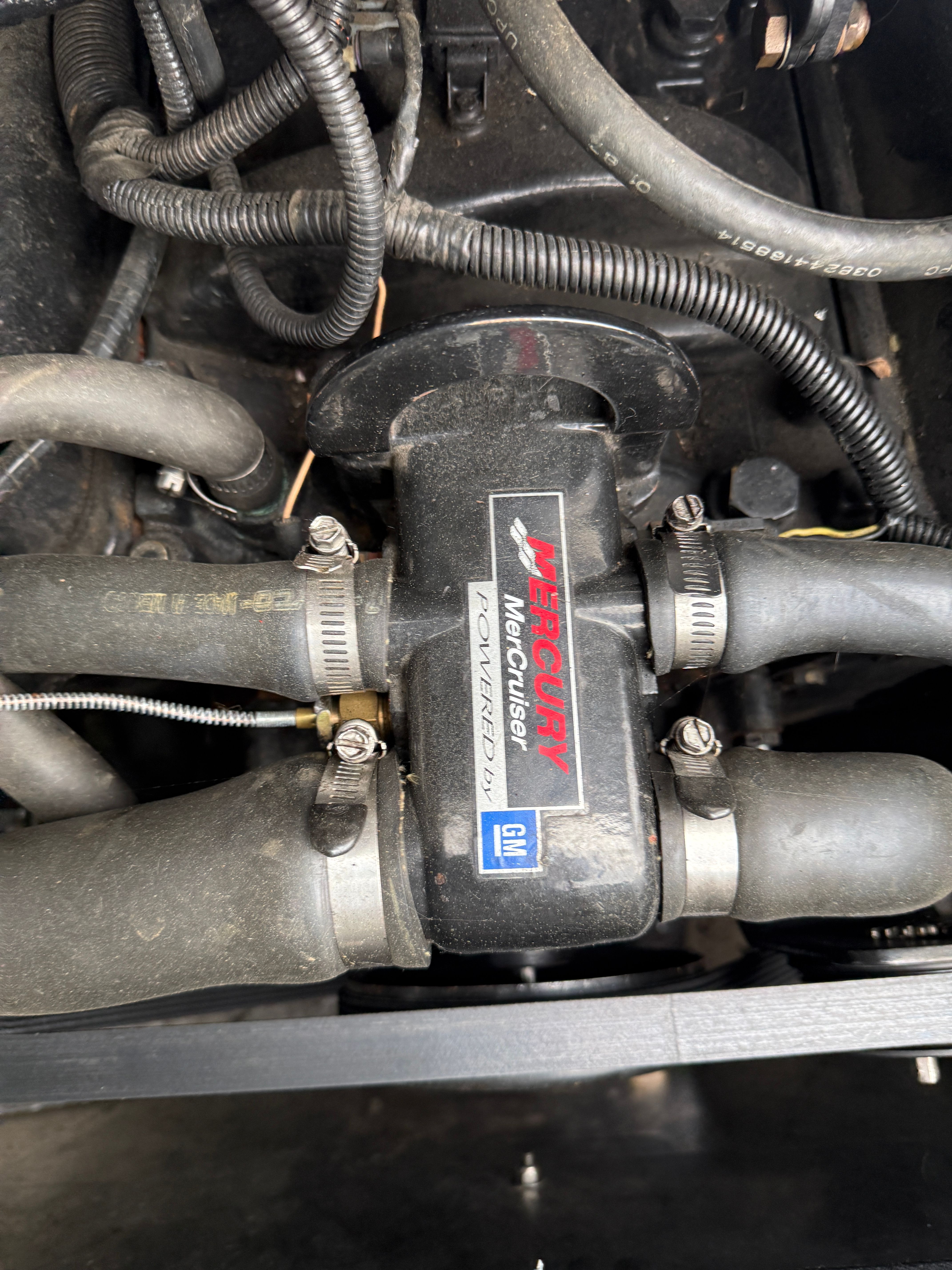 Engine compartment of a 2000 Crest Grand Caribbean with Mercury components.