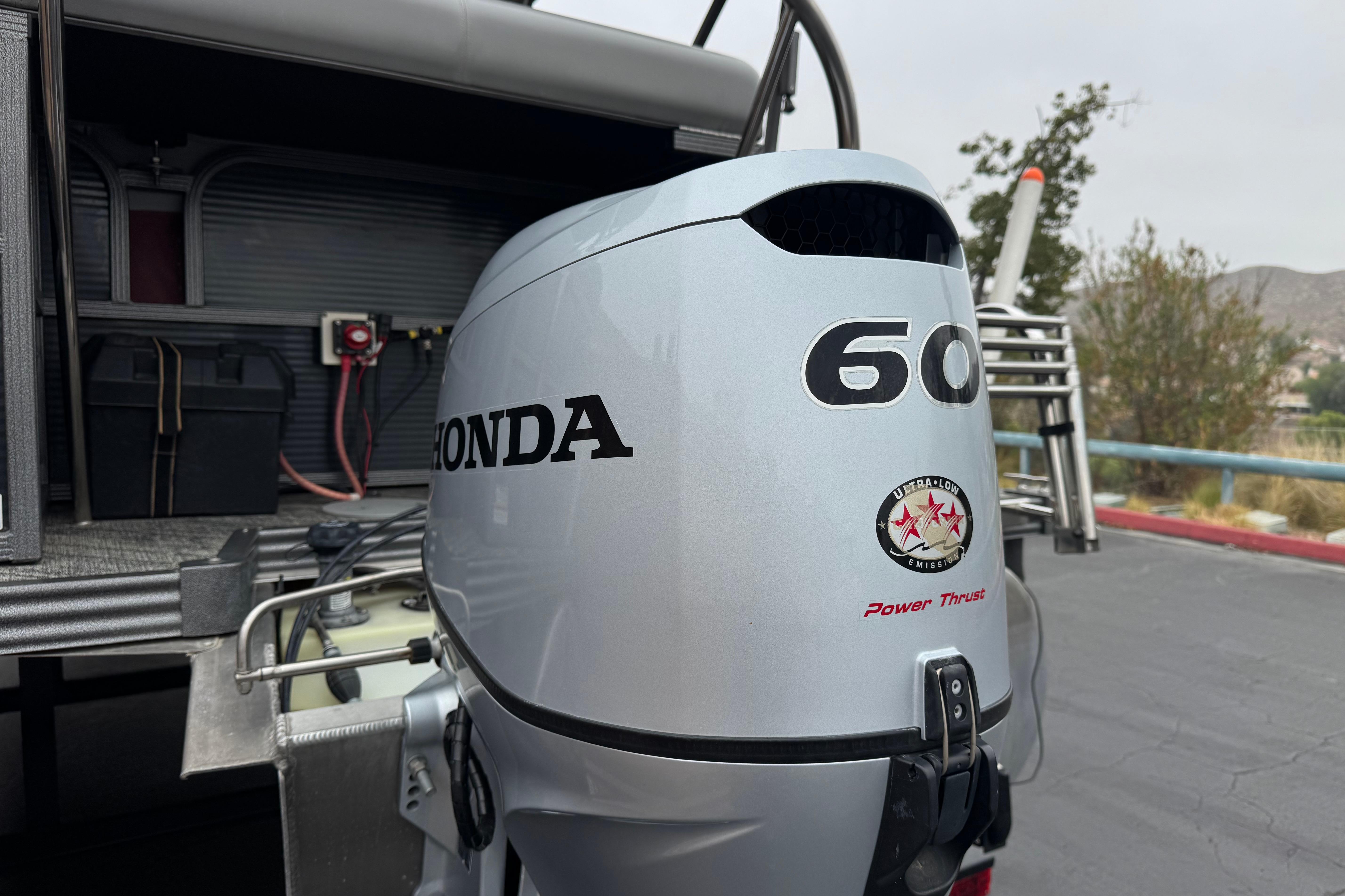 Honda 60 outboard motor on 2020 Manitou 18 Aurora LE pontoon boat.