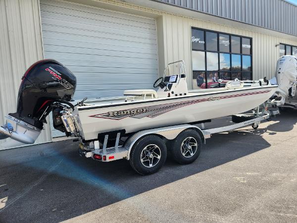 2025 Ranger RB200 boat on trailer, parked outside a building.