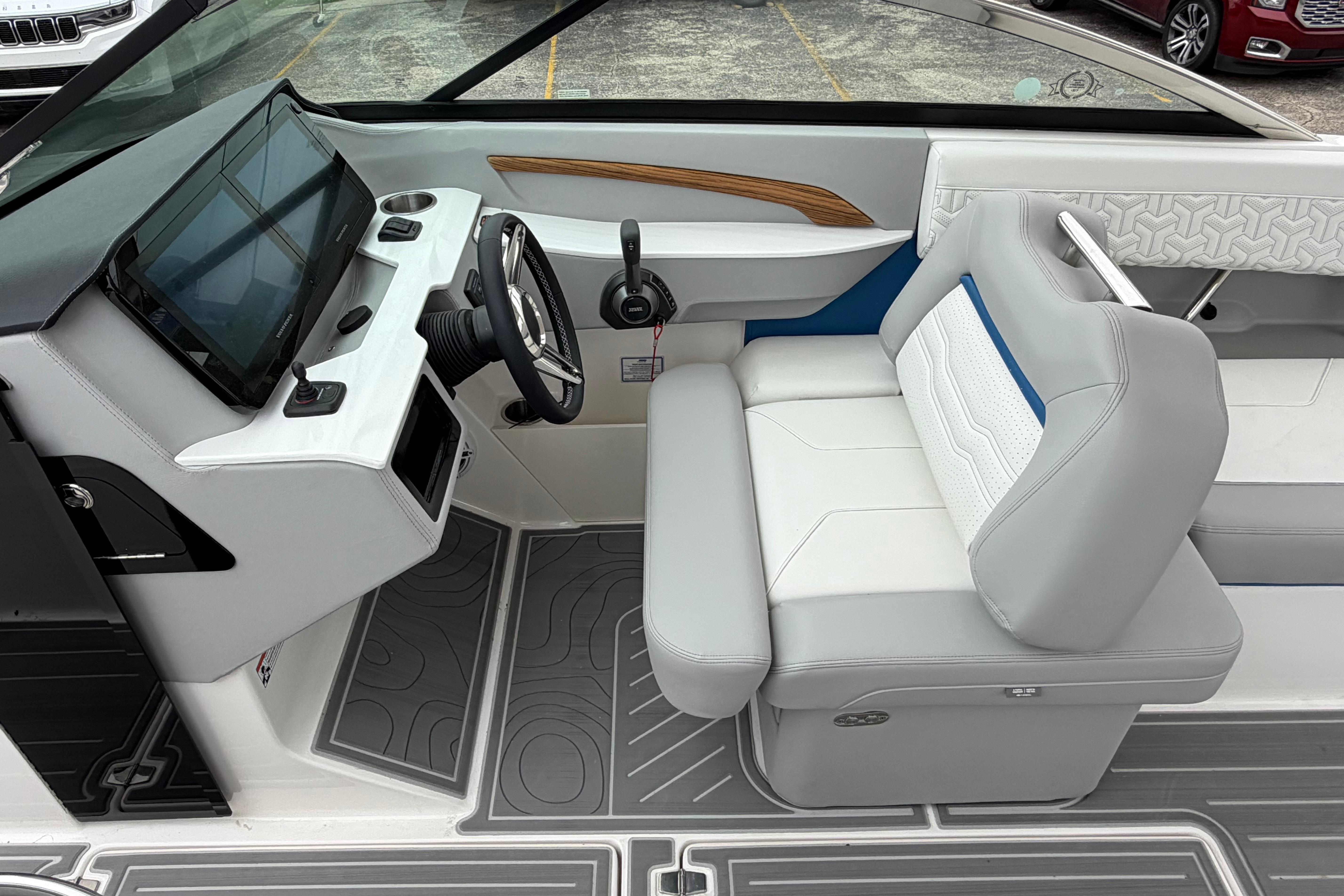 Interior of 2026 Regal LS9 Surf boat with modern dashboard and seating.