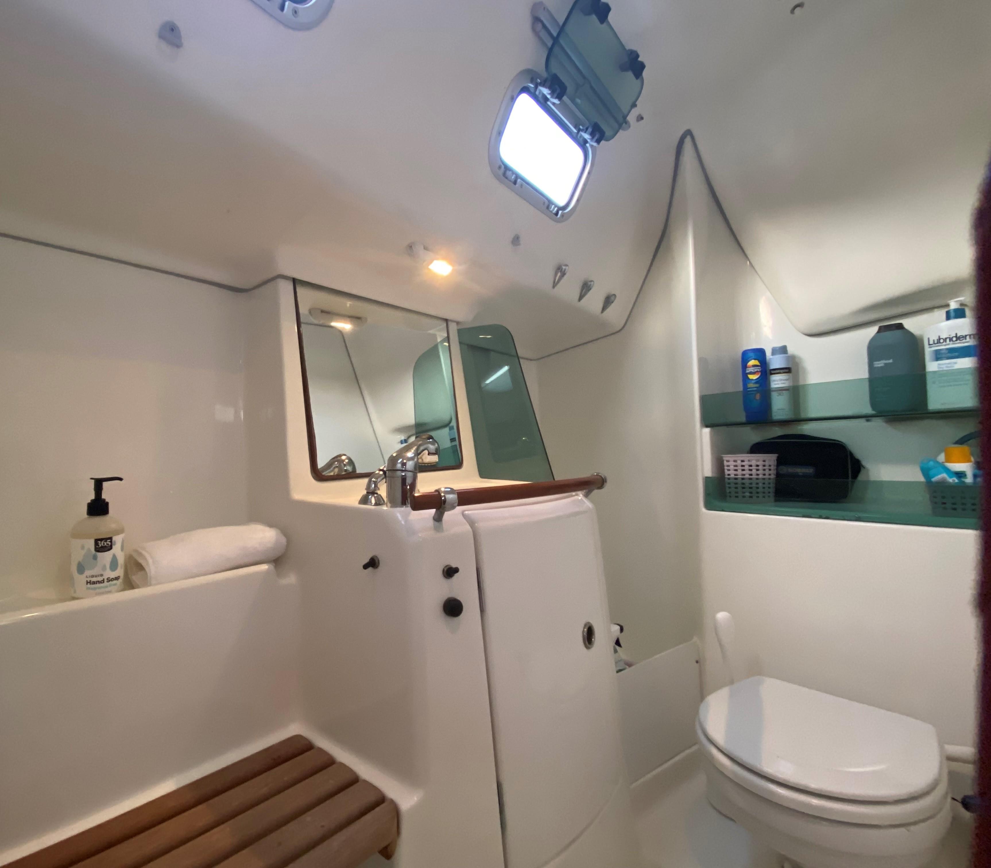 Interior view of a 2005 Beneteau 323 yacht bathroom.