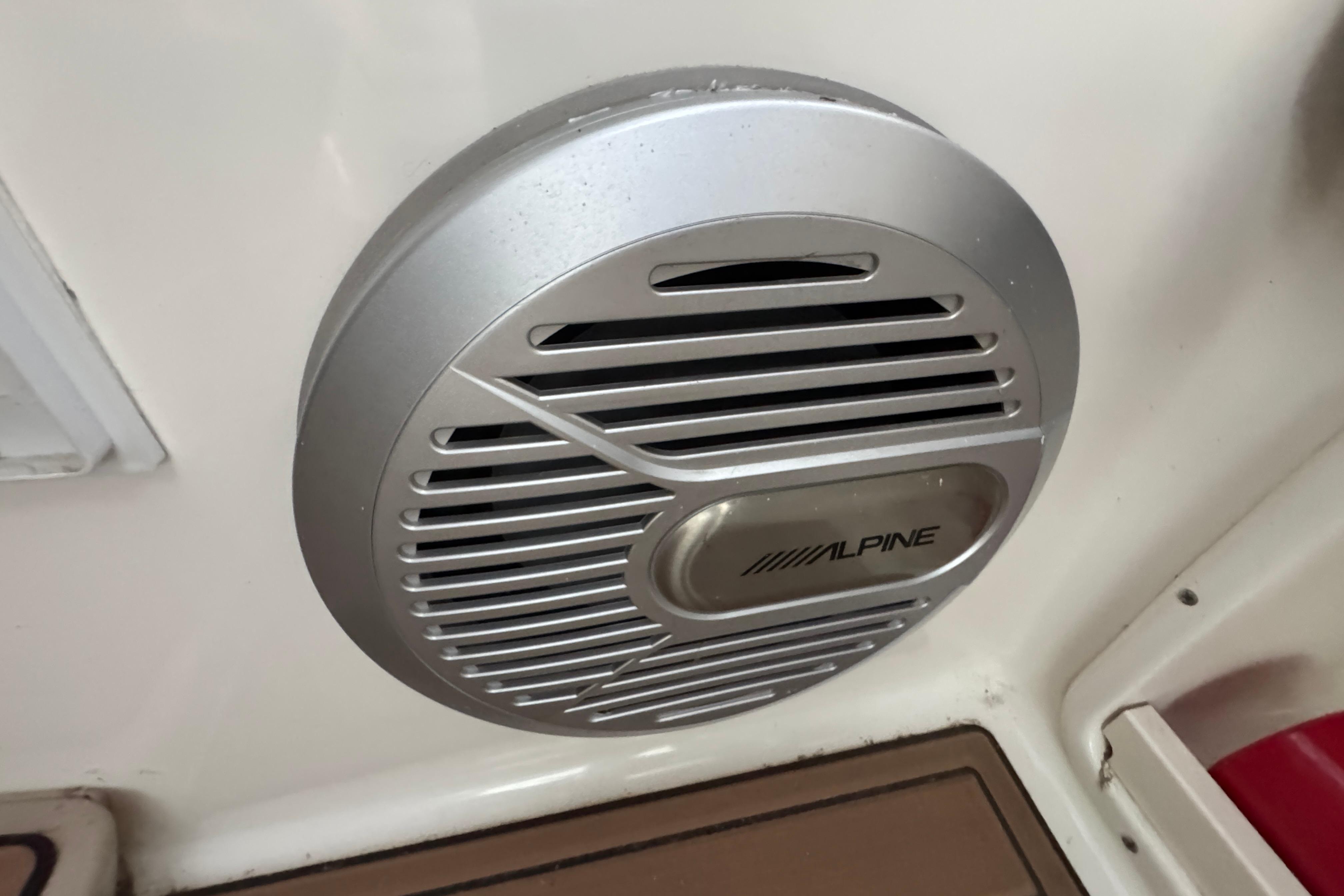 Alpine speaker installed on a 2006 Chaparral 330 Signature boat interior.
