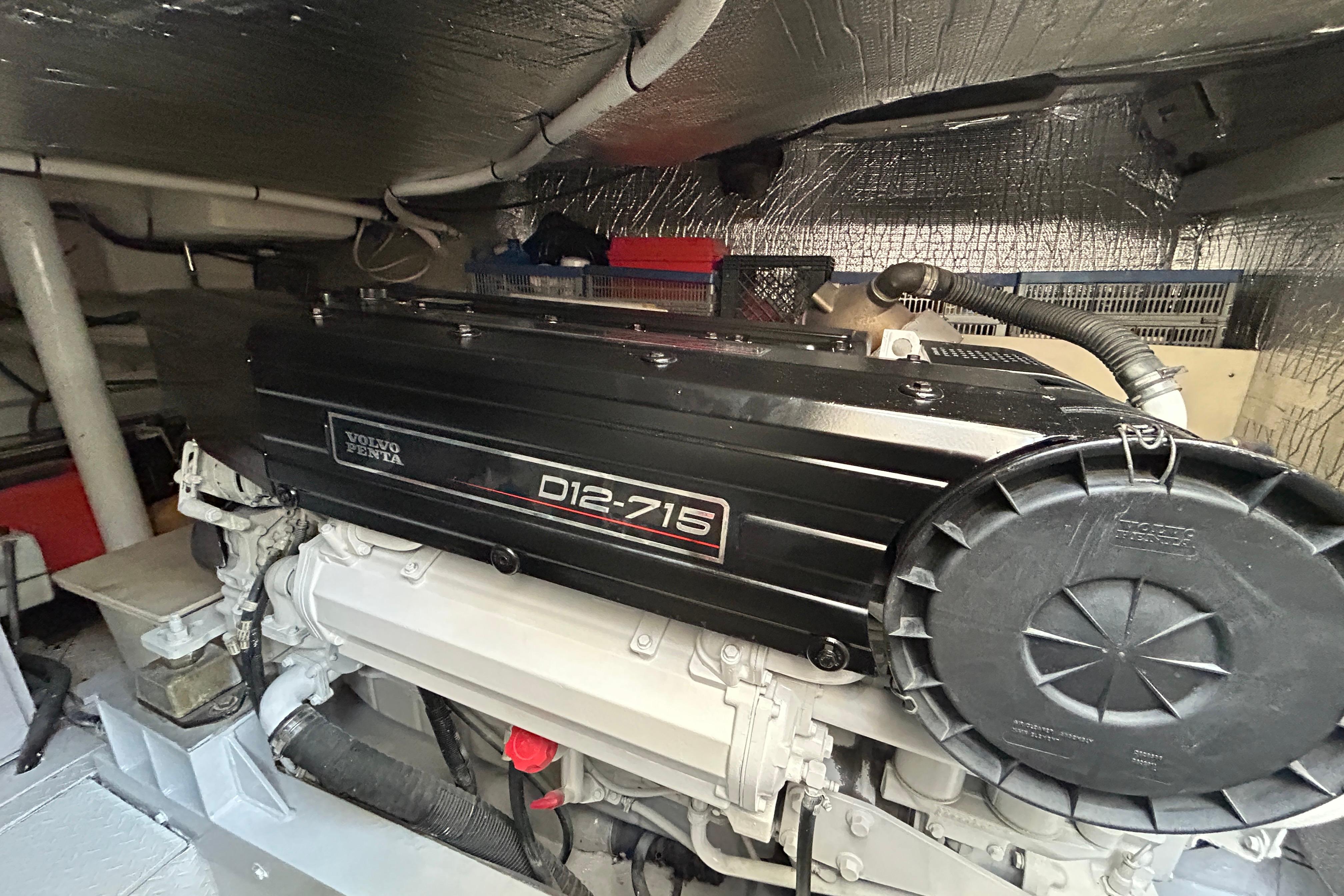 Engine room of 2003 Cruisers Yachts 540 Express with Volvo Penta D12-715 engine.