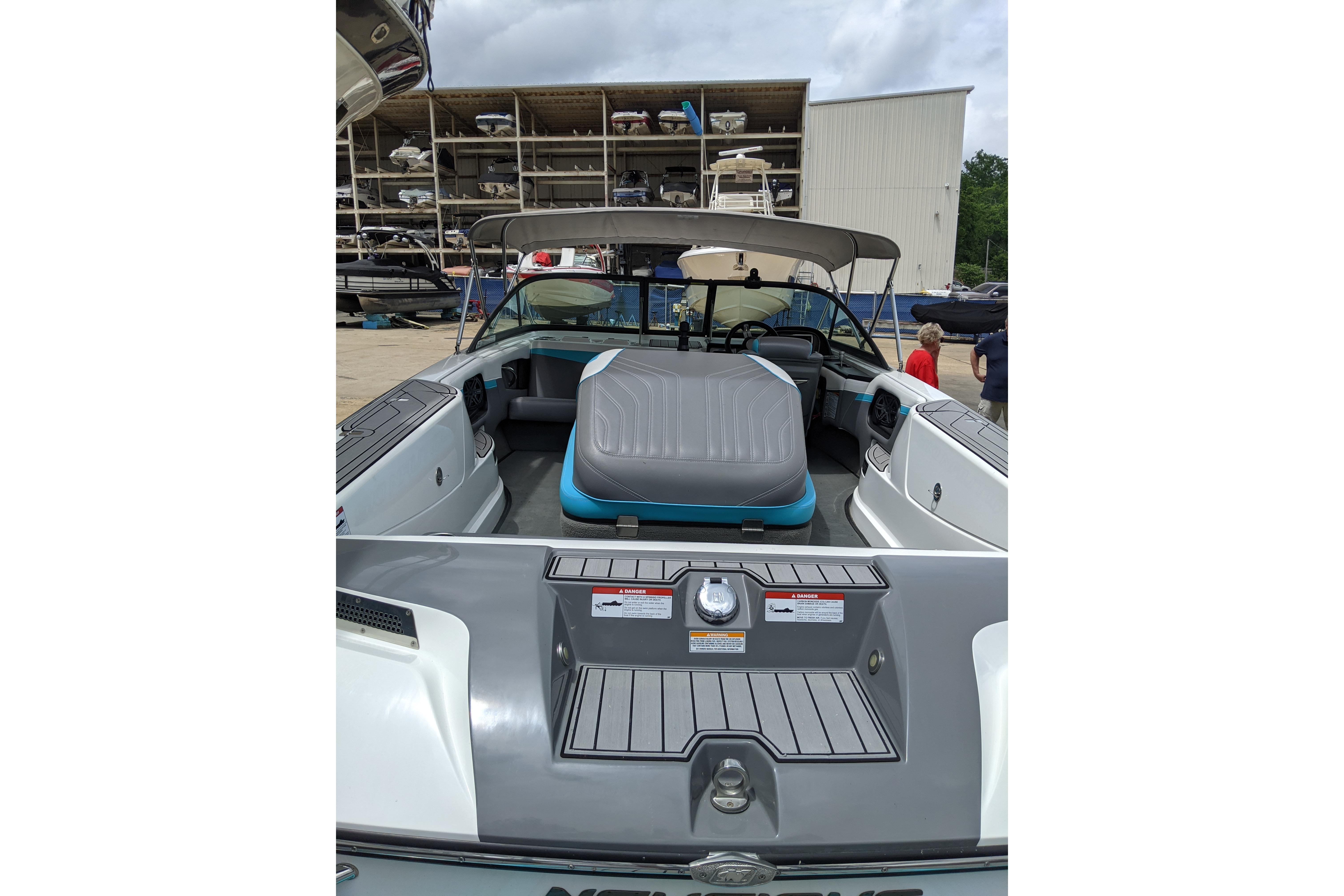 2016 Nautique Ski Nautique 200 Closed Bow boat interior with seating and dashboard view.
