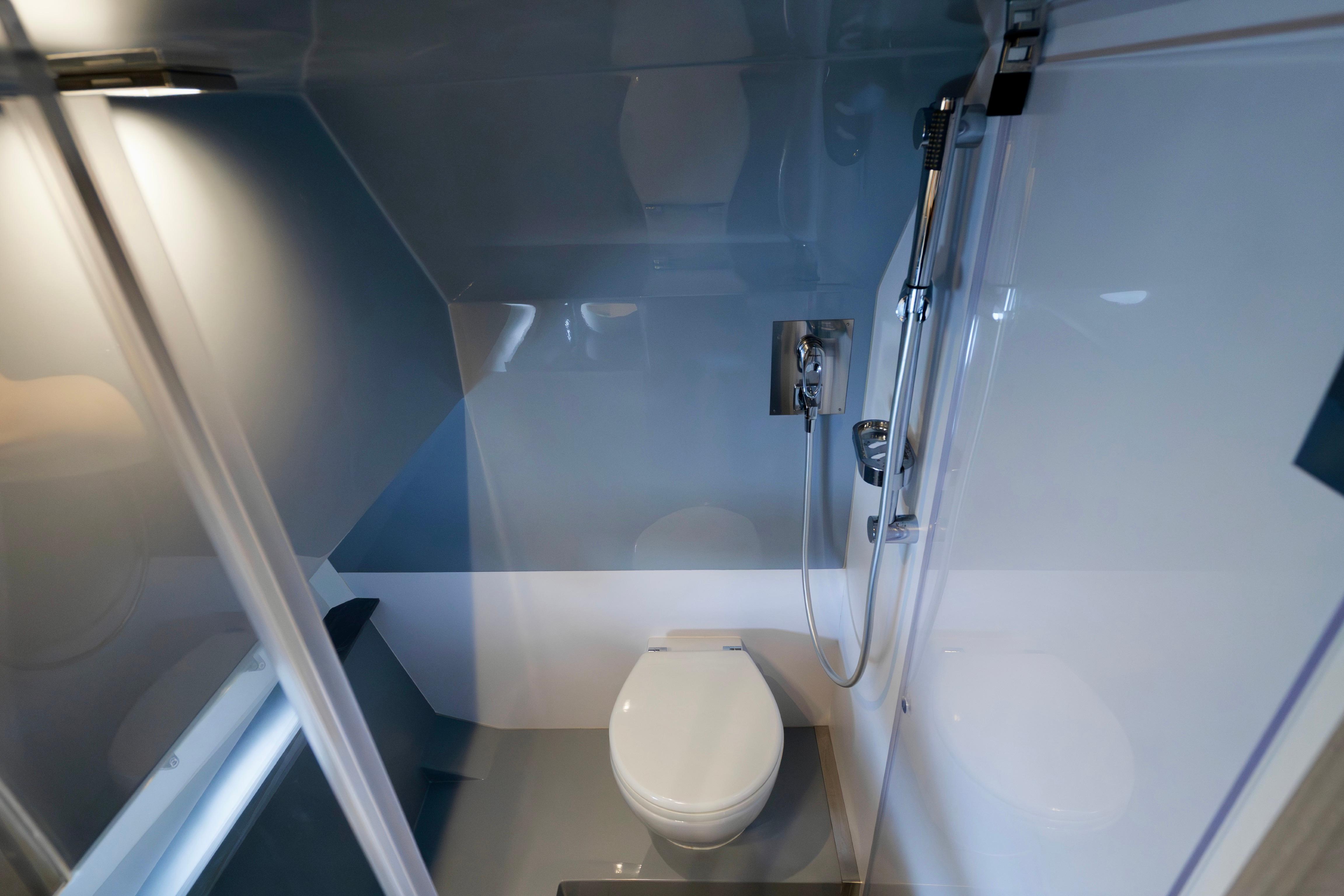 Modern bathroom in 2023 Rio Yachts Daytona 34, featuring sleek design and compact amenities.