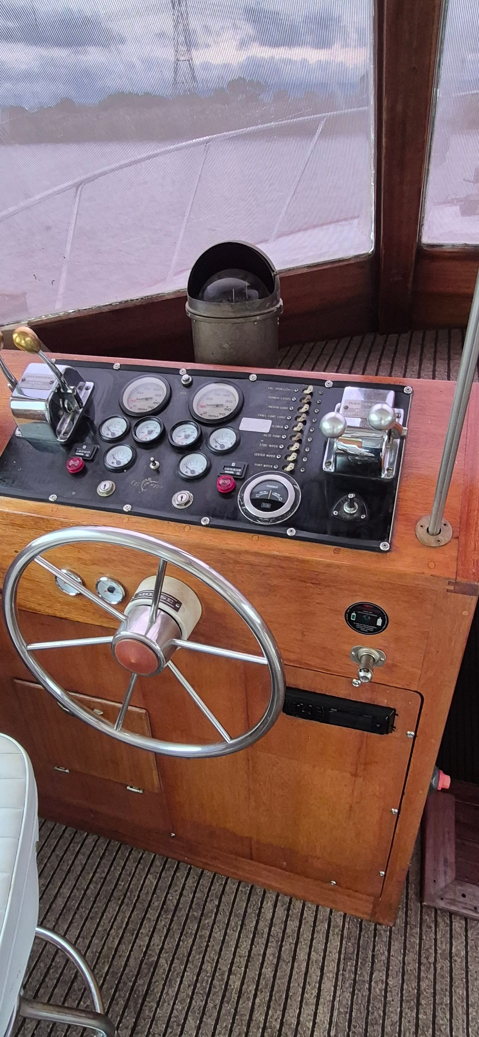 Helm console of a 1976 Egg Harbor 33 Sportfisher.