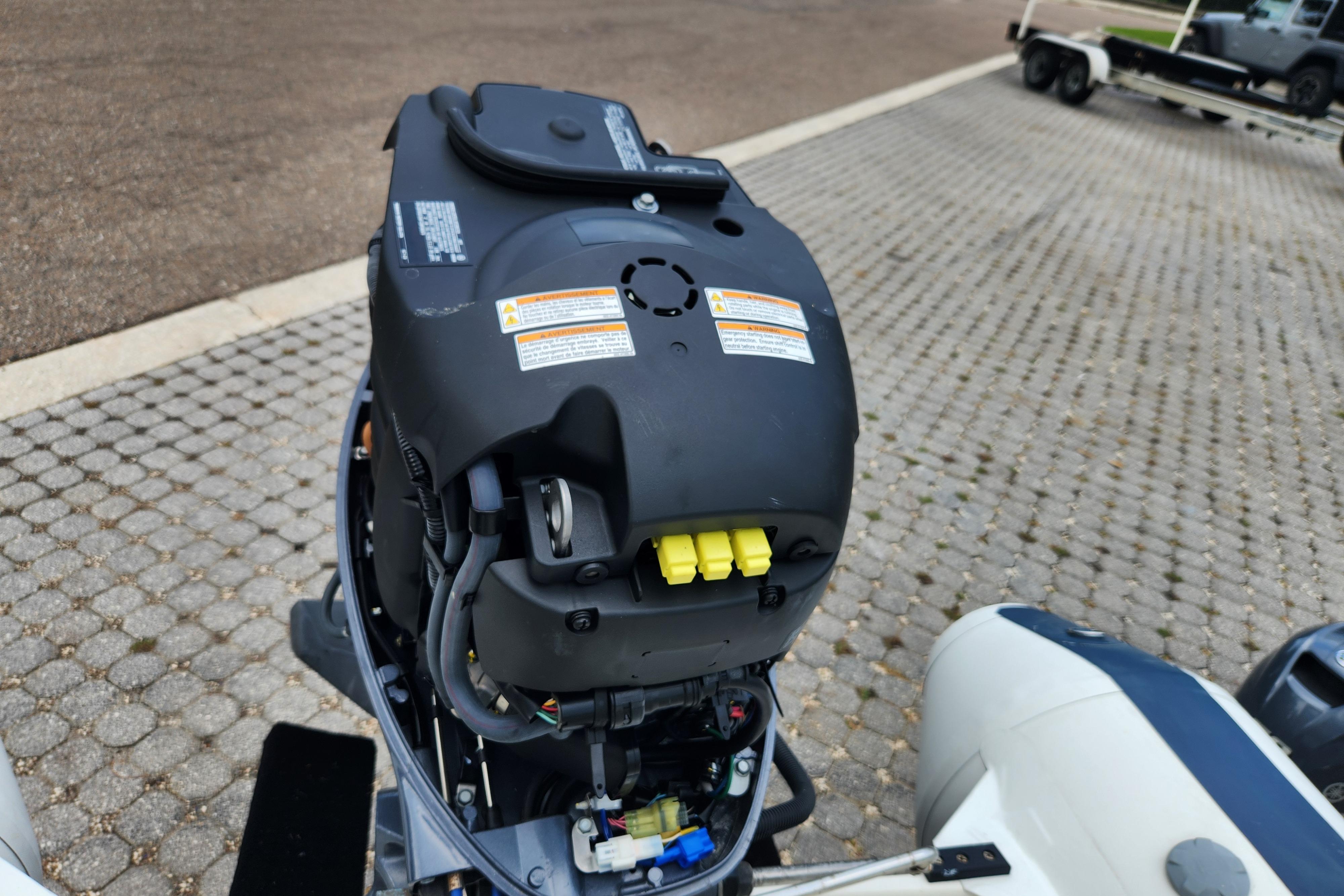 2019 Novurania DL 400 outboard motor on a paved surface.