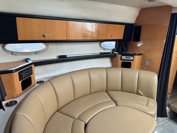 Interior of 2006 Chaparral Signature 310 yacht with leather seating area.