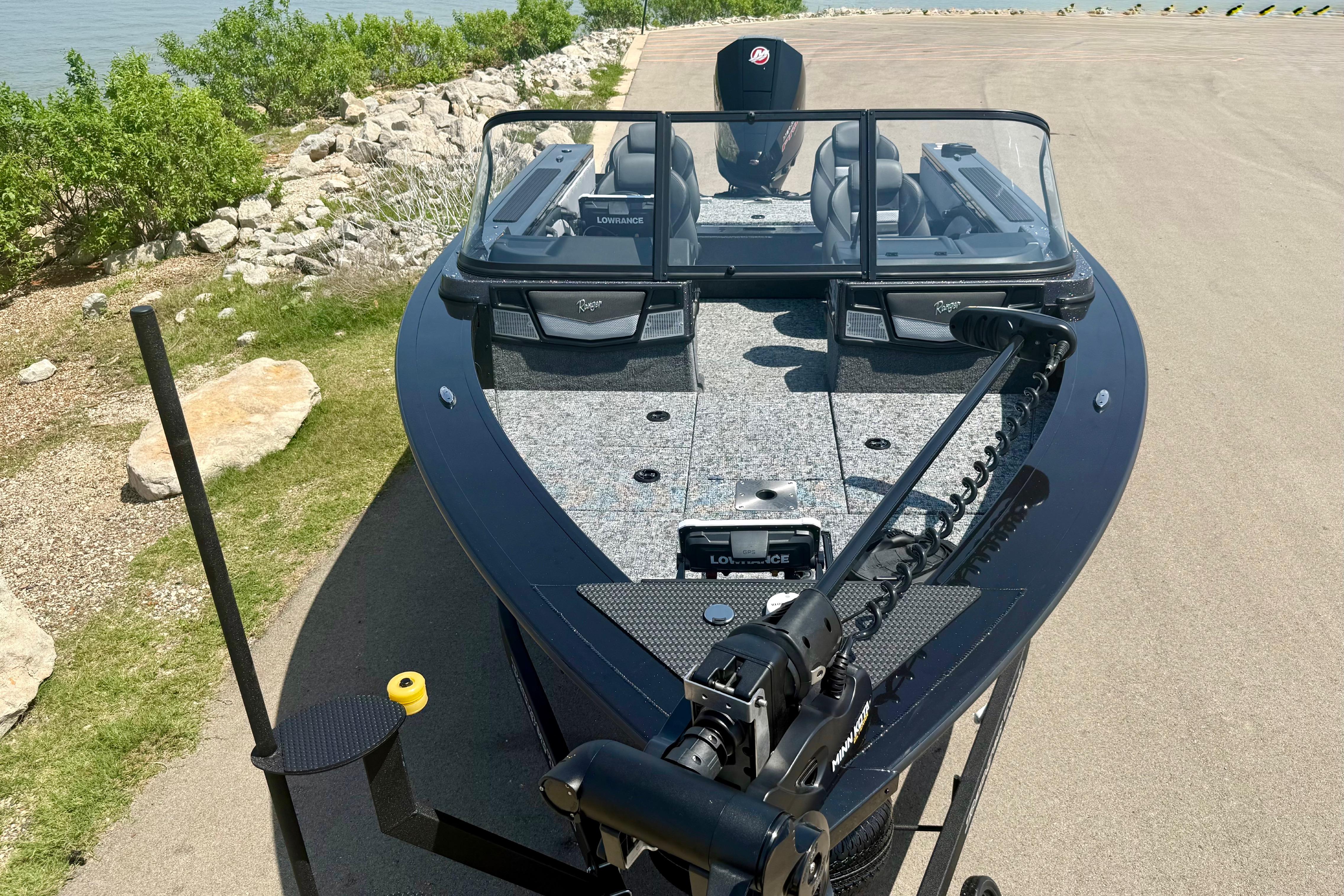 2026 Ranger VX1788 WT boat on a lakeside road, featuring advanced navigation equipment.