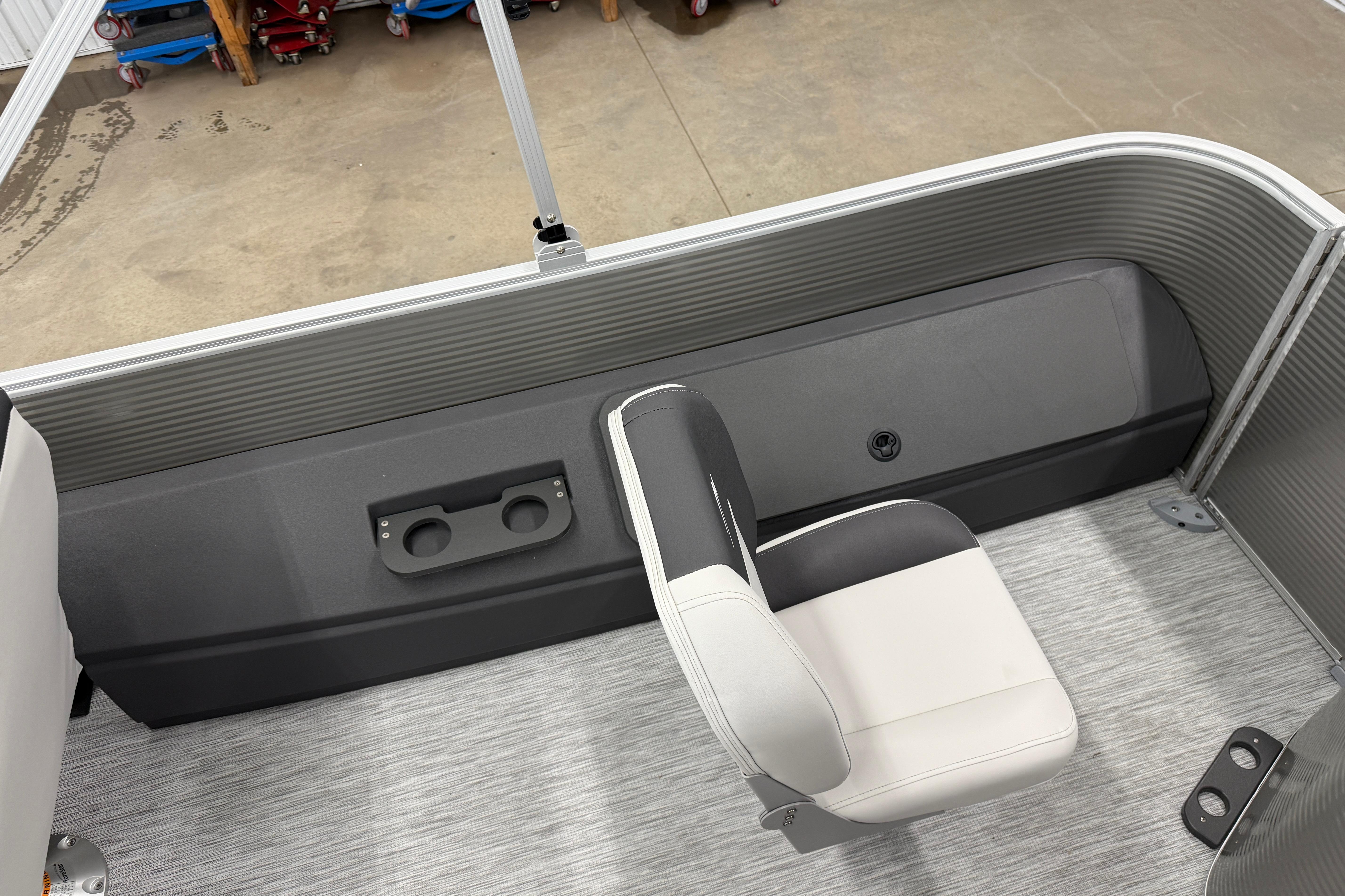 Interior of 2026 Bennington 20 SF boat with seating and cup holders.