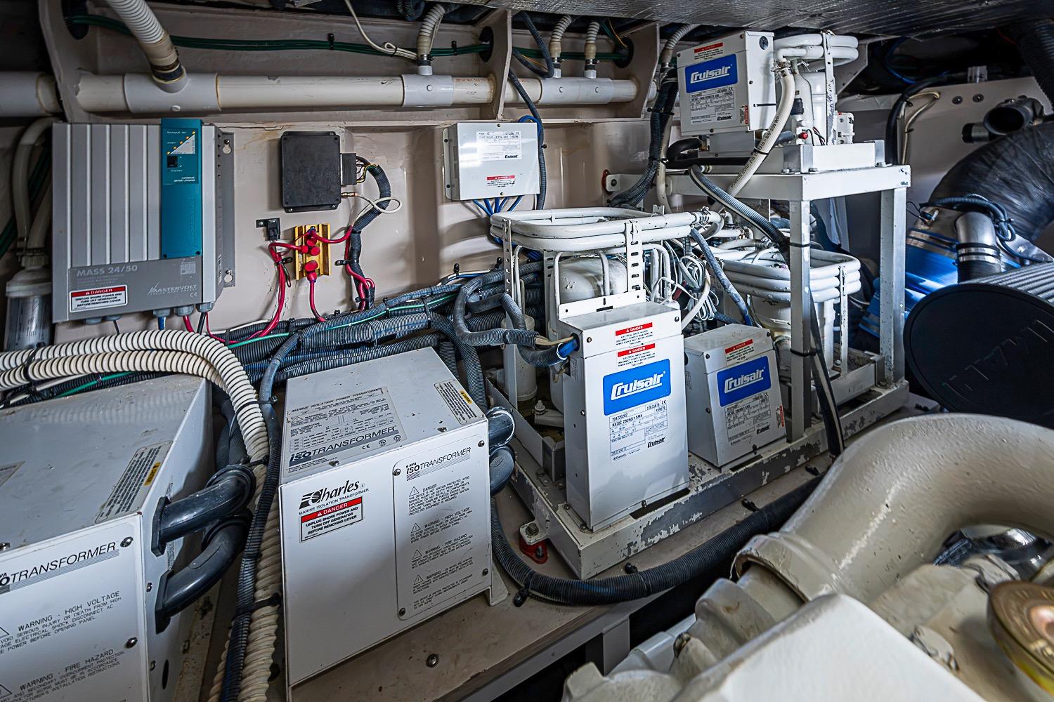 Engine room of 2008 Sea Ray 60 Sundancer with electrical systems and components.