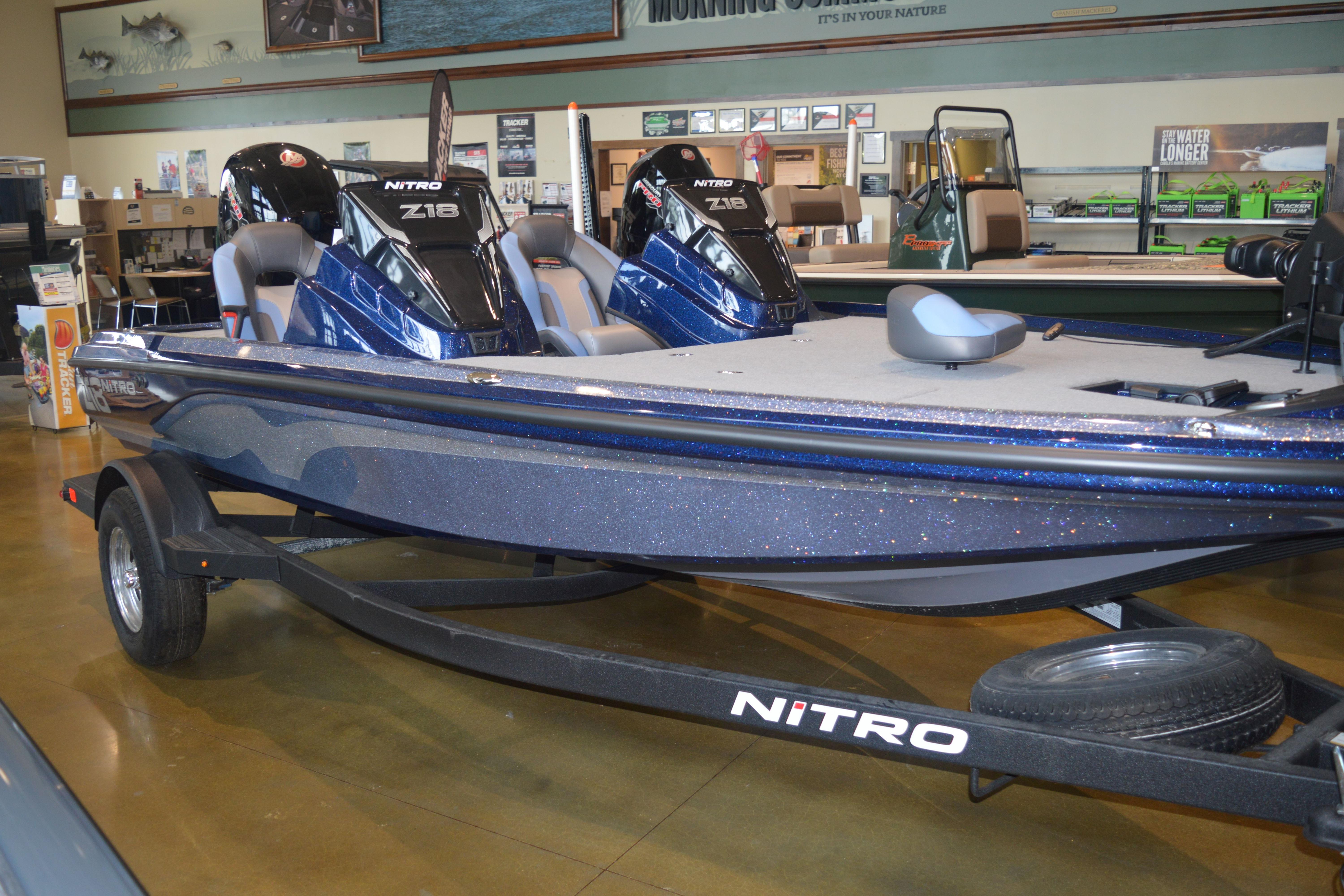 2026 Nitro Z18 Pro boat displayed indoors on a trailer.