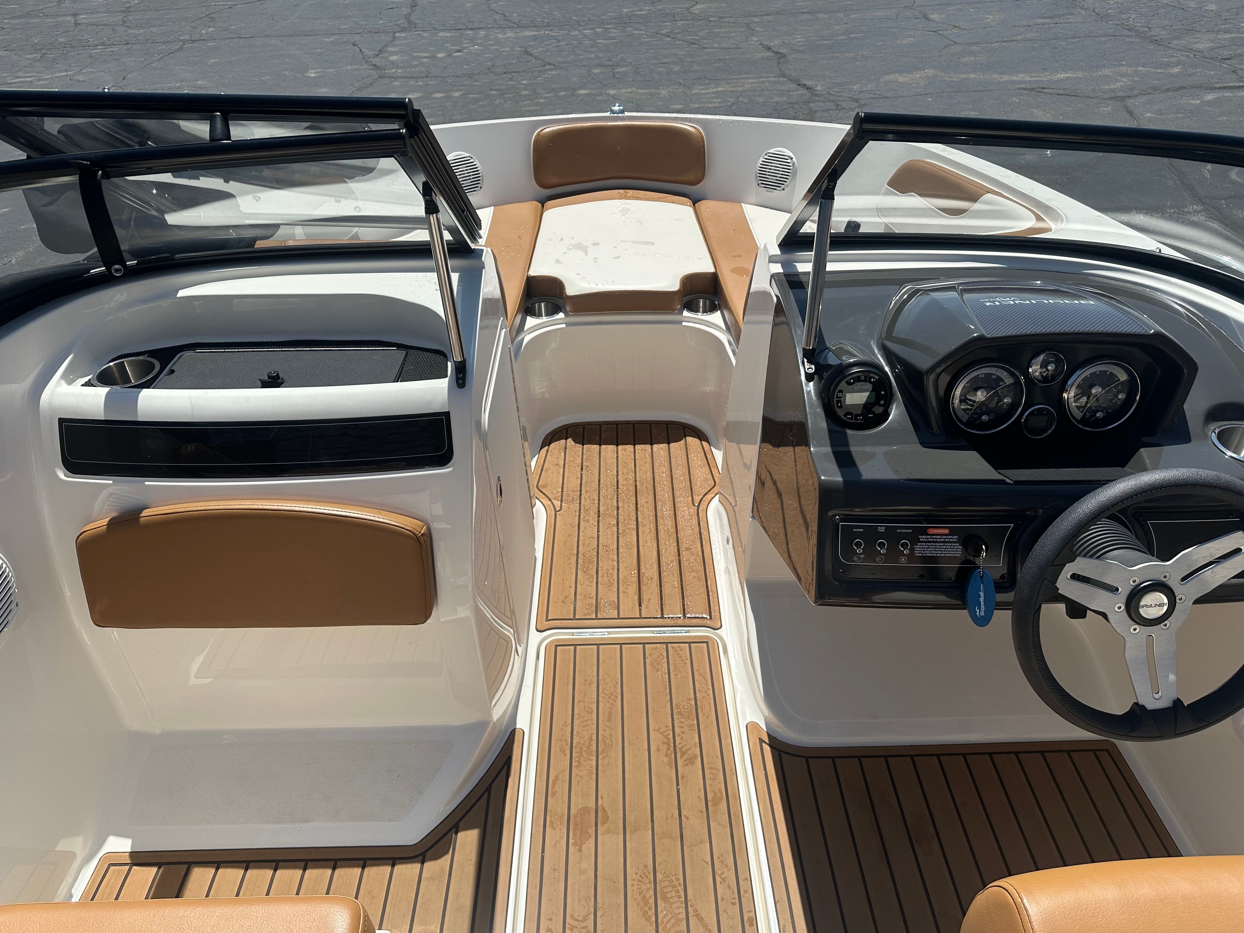 Interior of 2022 Bayliner VR5 Bowrider I/O with wood finish.