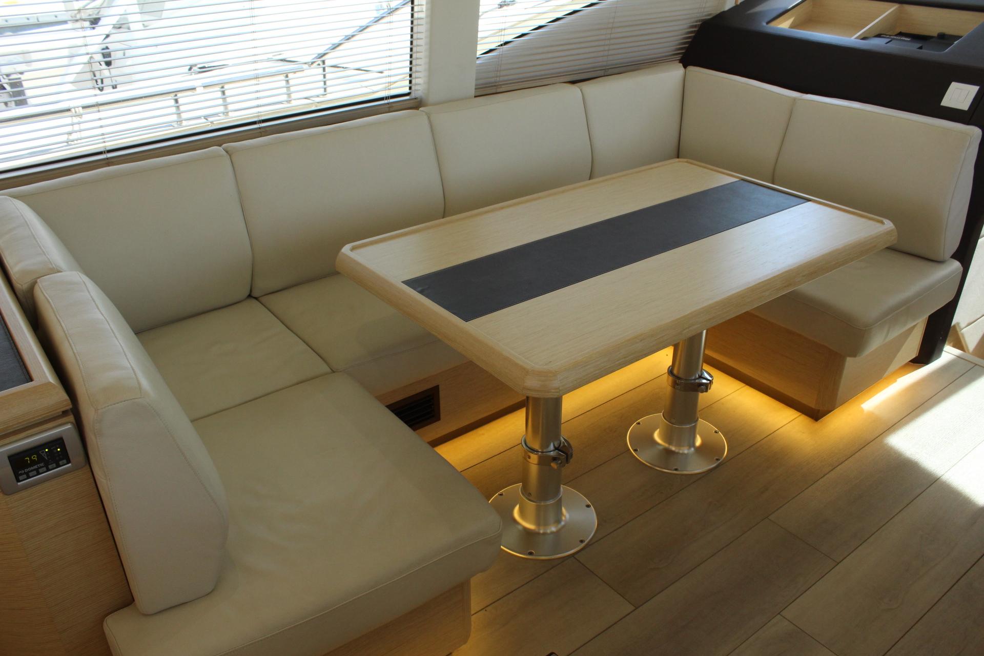 Interior of 2019 Greenline 48 Coupe with elegant seating area.