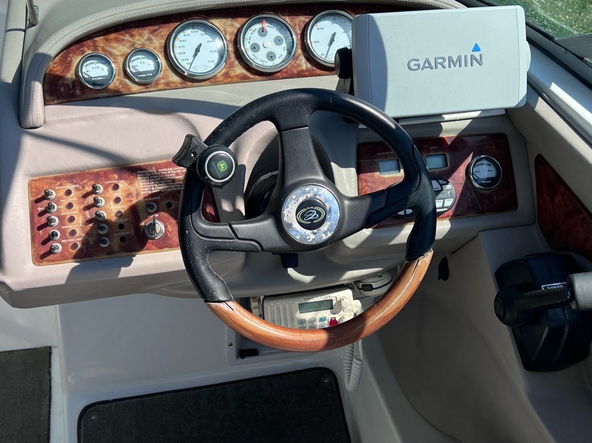 2003 Cobalt Colbalt 262 dashboard with Garmin navigation system.