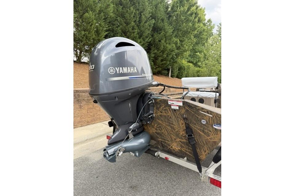 2026 G3 Gator Tough 18 CCJ boat with Yamaha outboard motor, parked outdoors.