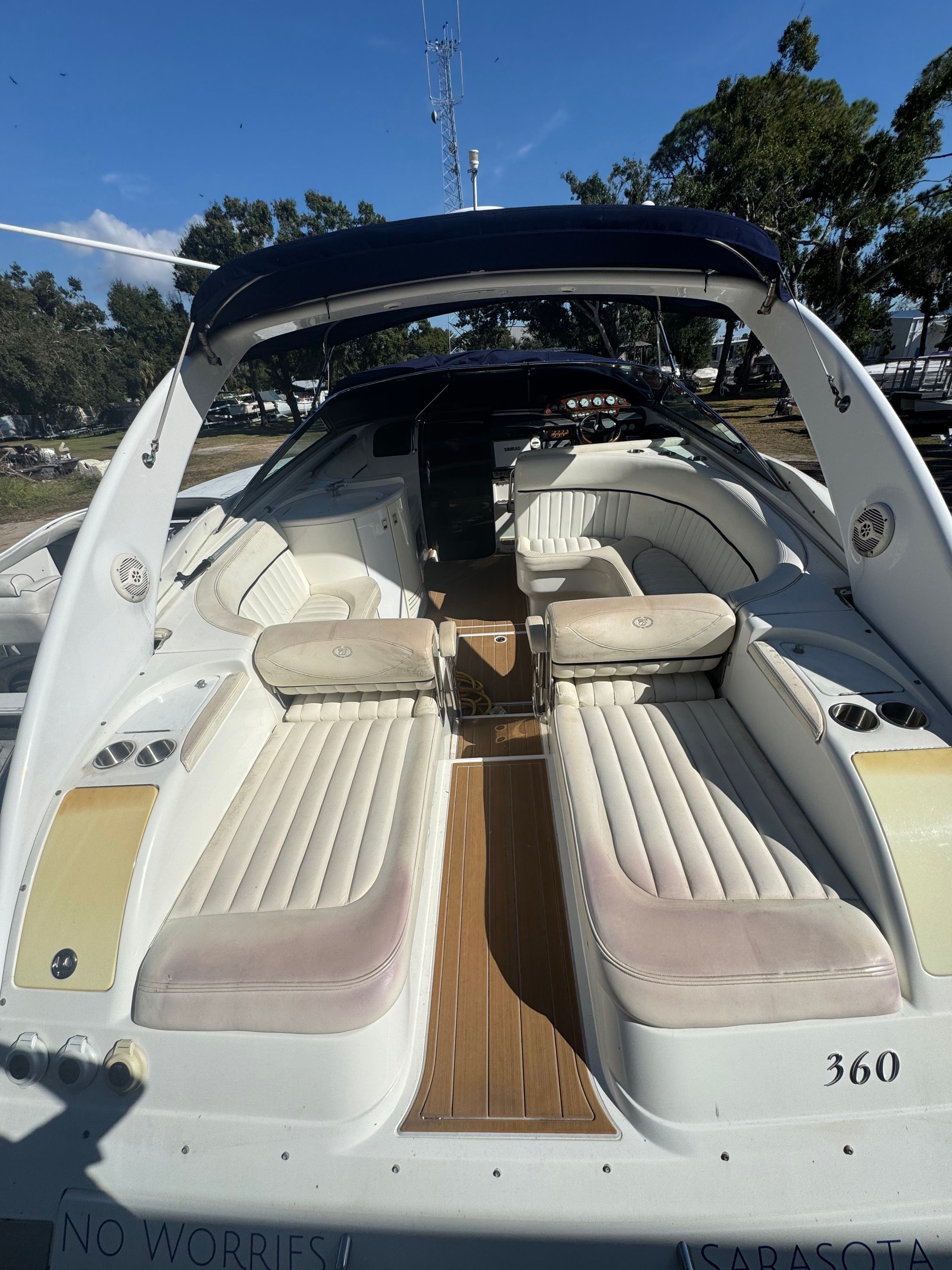 2003 Cobalt 360 with spacious cockpit and comfortable seating, perfect for relaxing.
