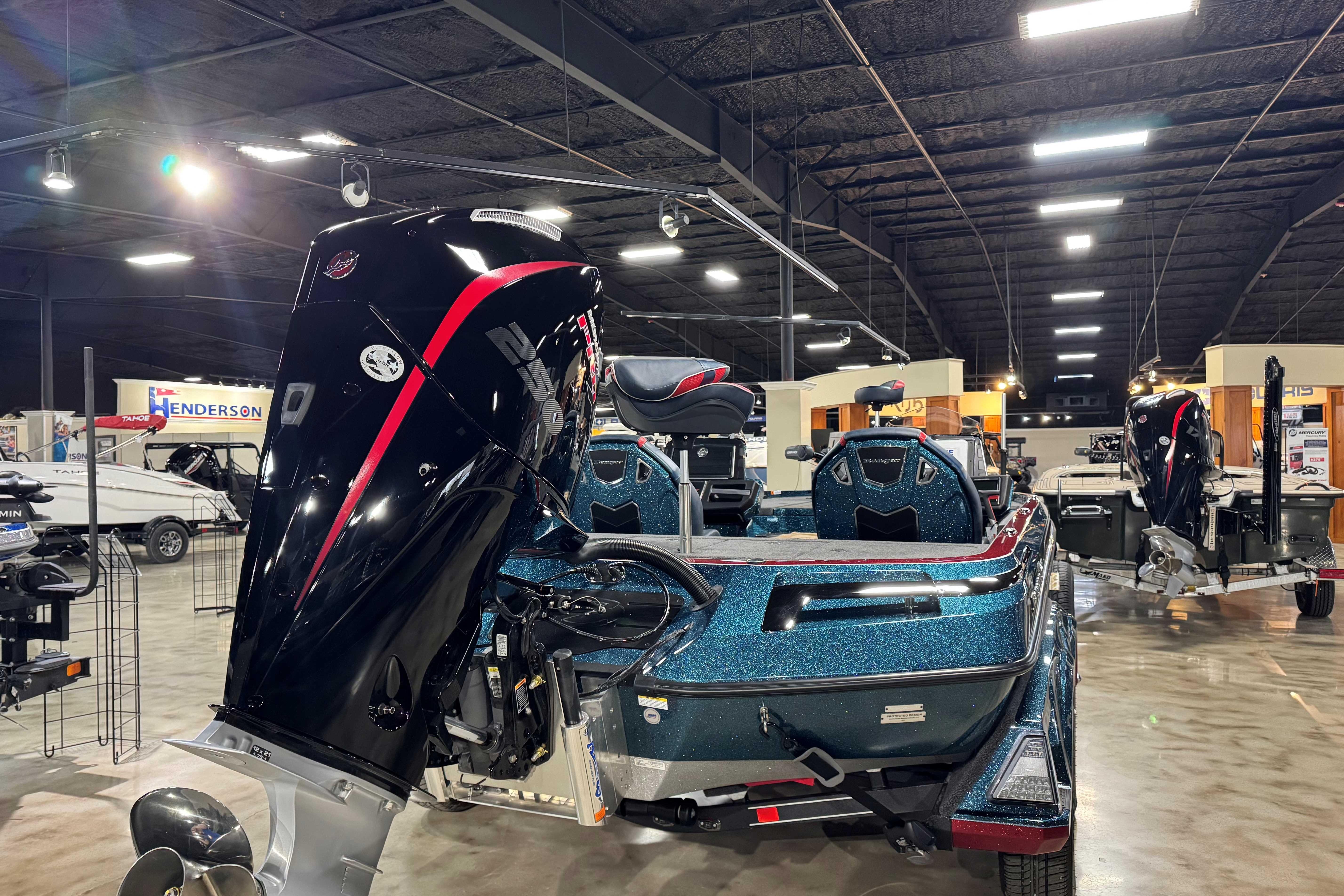 2025 Ranger Z520R Cup-Equipped boat displayed in a showroom with sleek design and powerful engine.
