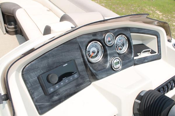 Dashboard of 2021 Tahoe LTZ Cruise boat with gauges and controls.