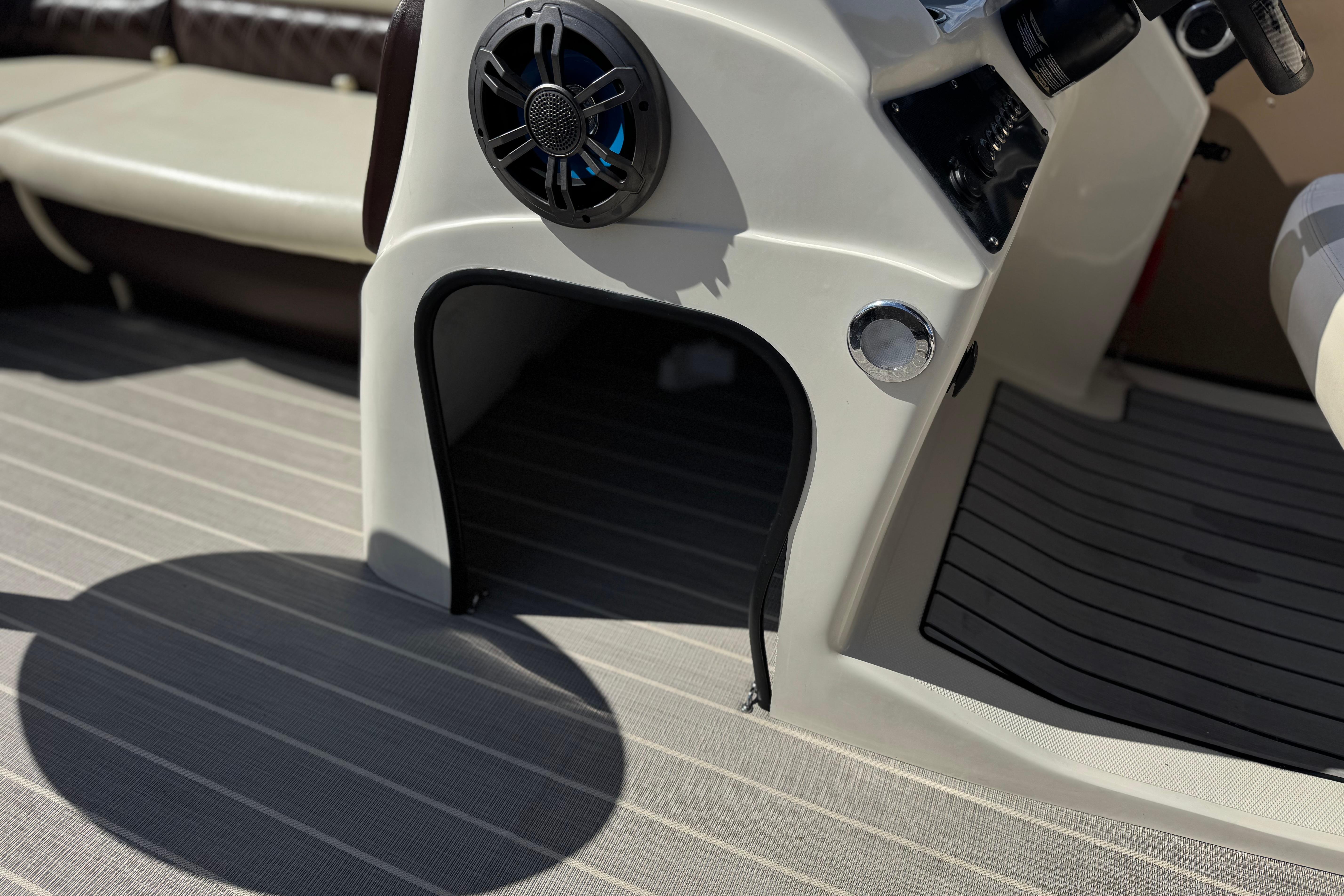 2023 Lexington 623 ST Xtreme boat interior with speaker and seating area.