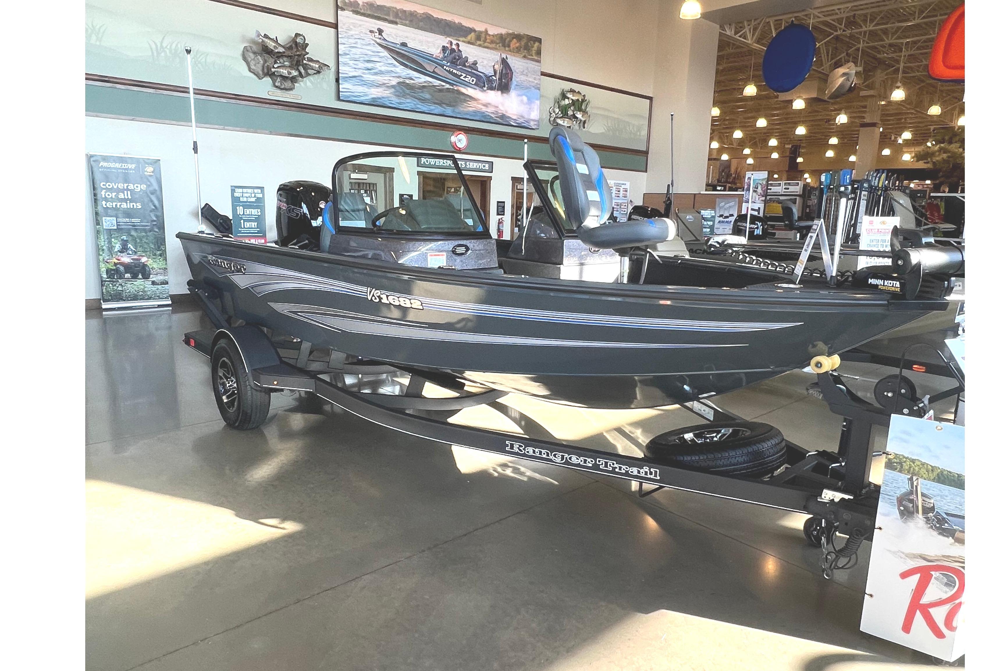 2024 Ranger VS1682SC Angler boat displayed in showroom with modern lighting.