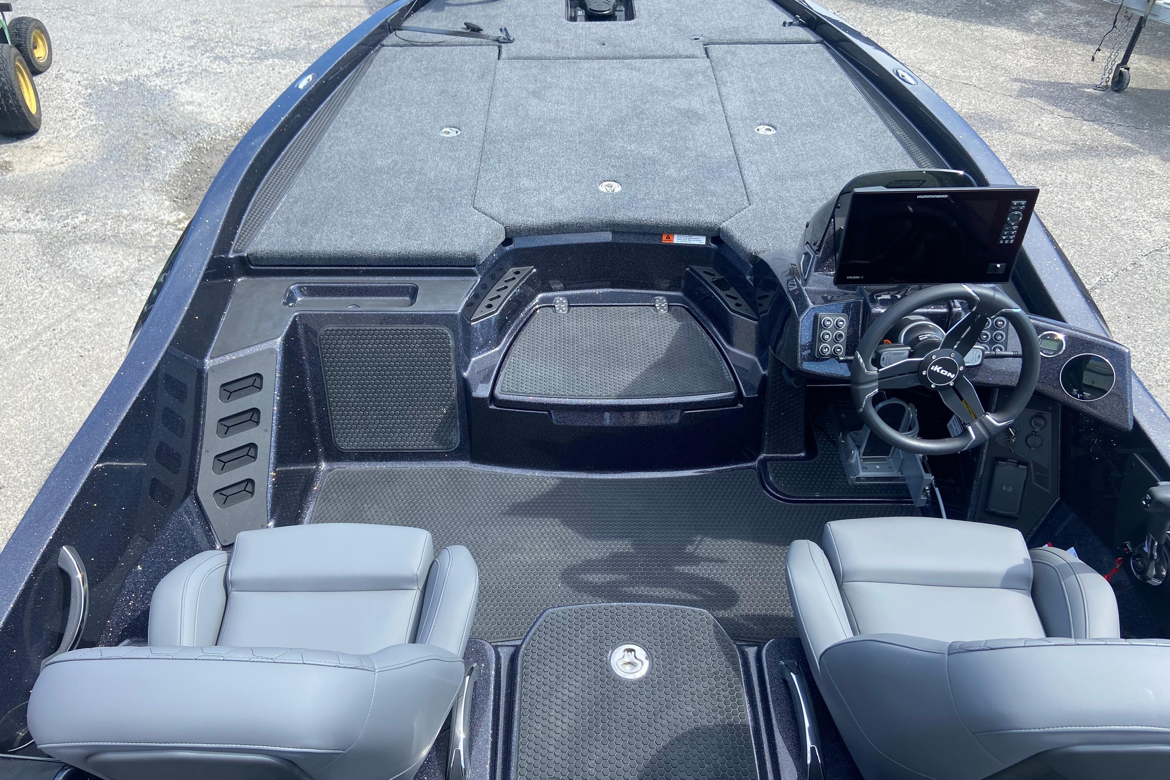 Interior of 2026 iKon VLX 20 boat with modern dashboard and seating.